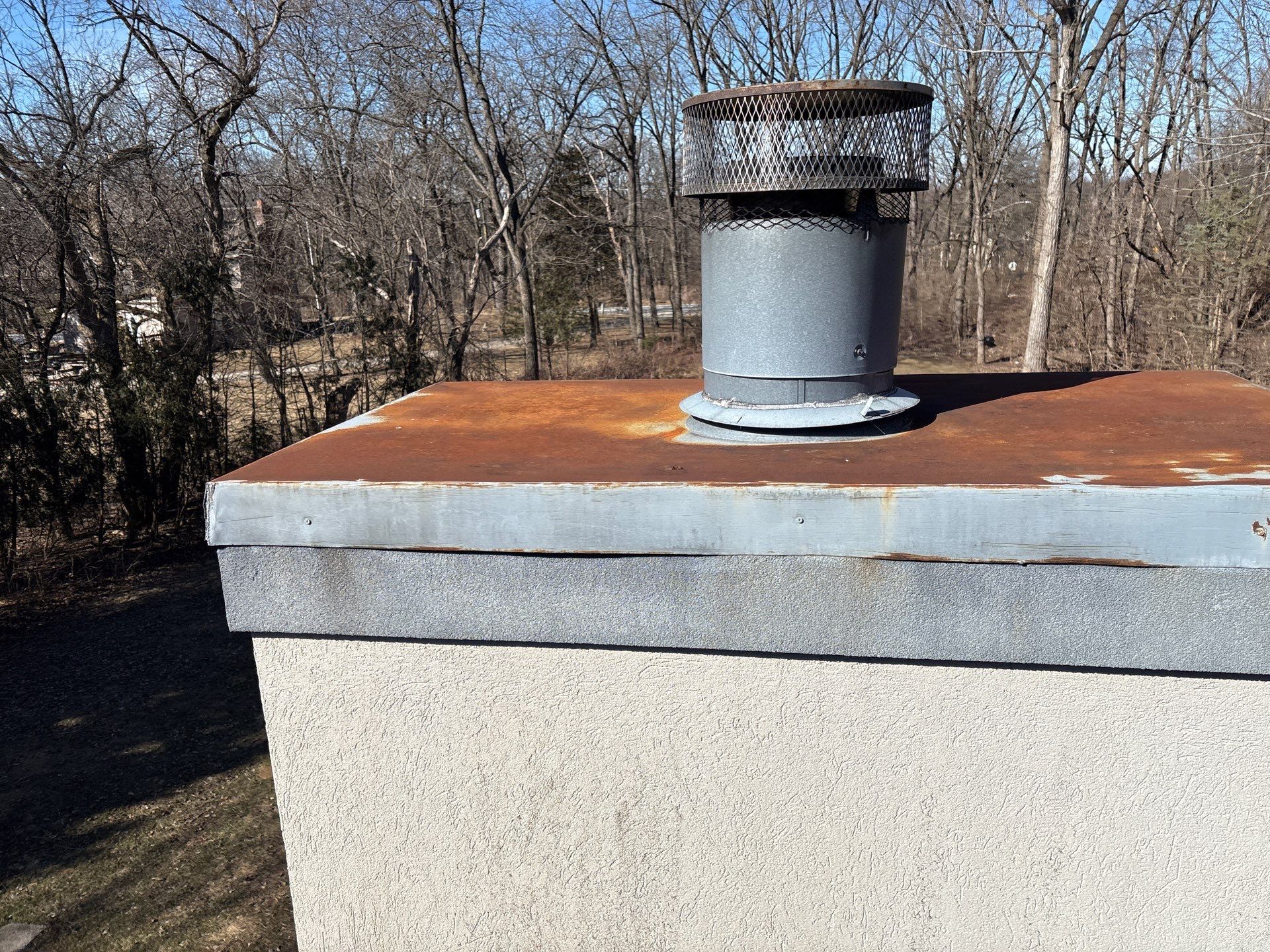 Powder Coated Stainless Steel Chase Cover Installation by Leonard and Sons Building Services, Inc.