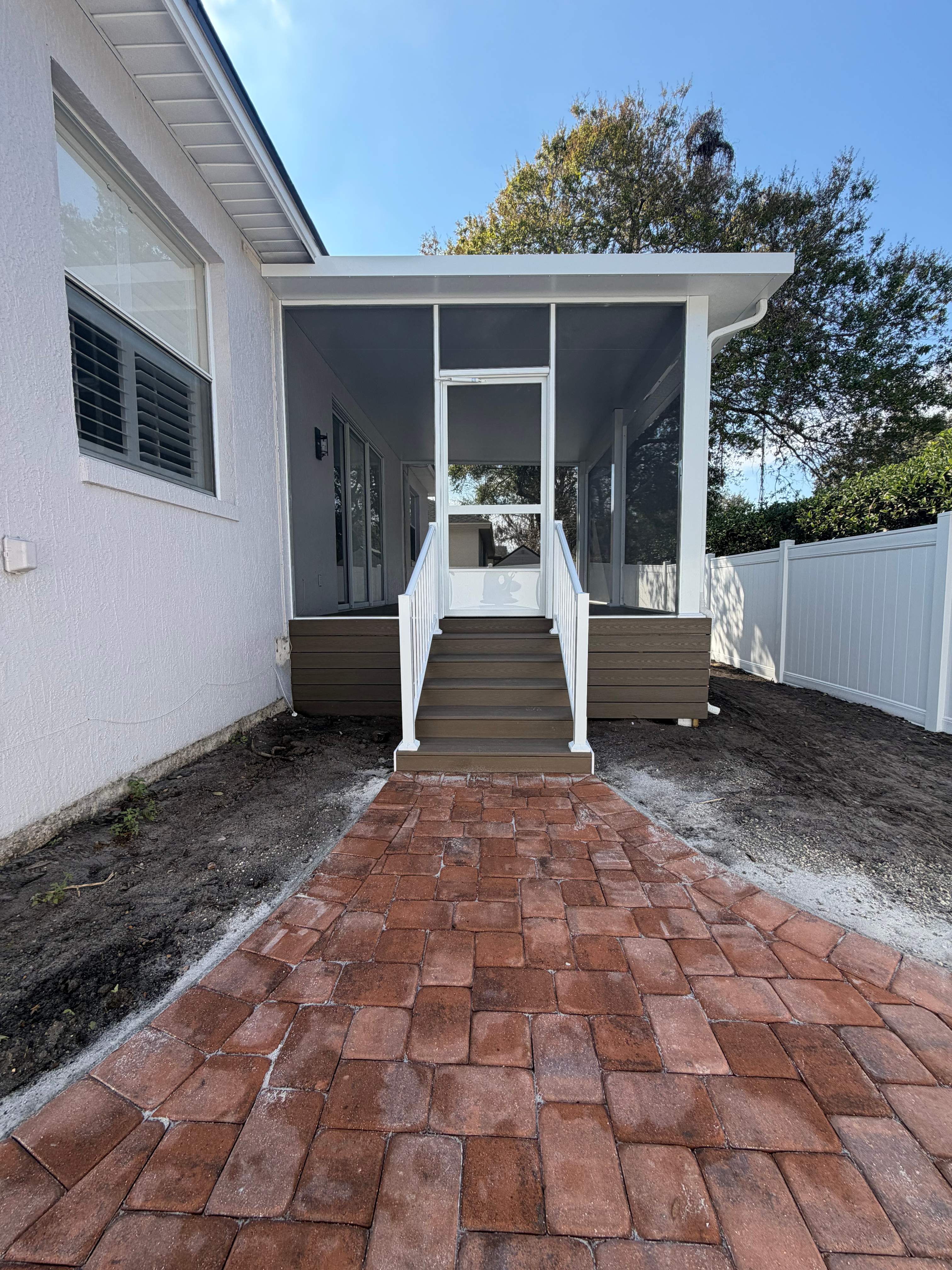 The Complete Backyard Retreat: Insulated Screen Room & Composite Deck by Orlando pergolas