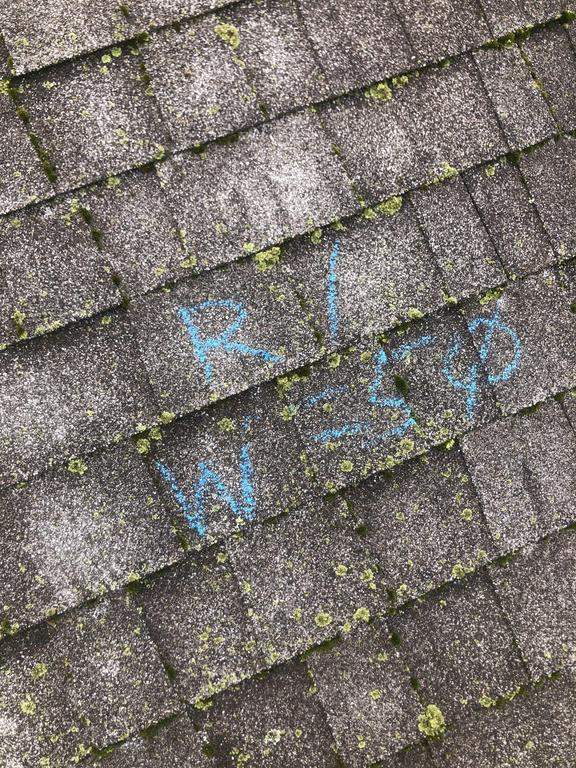 Storm damage roof replacement by Nitro Roofing and Construction