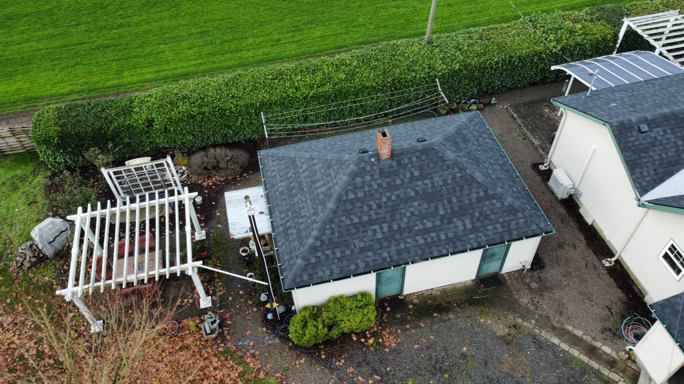 Residential Roofing Installation using IKO Dynasty (Color: Granite Black) by Orezona Building & Roofing Company, Inc.