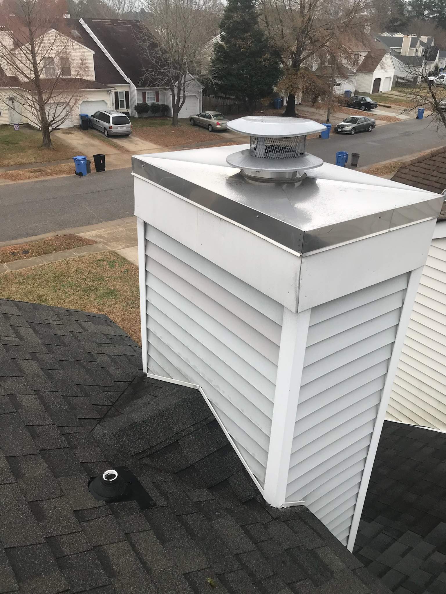 New Chase Cover + Old Cap by Premier Chimney and Roofing