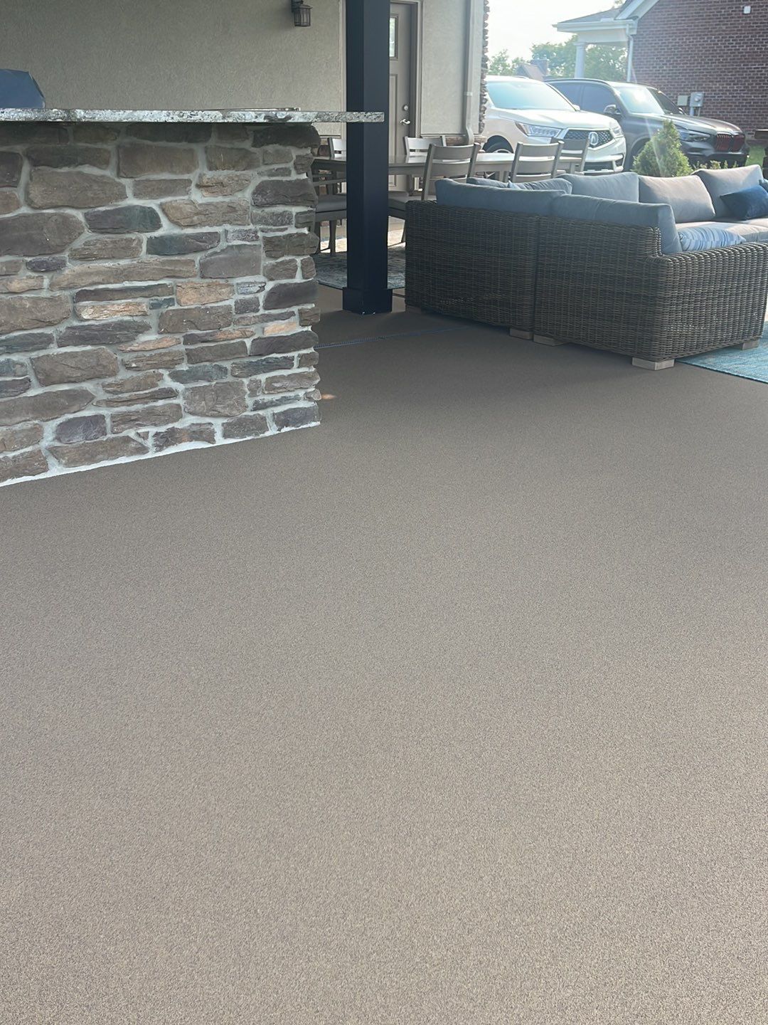 Large Patio + Garage Project in Moon Township by Floors in a Day, Inc