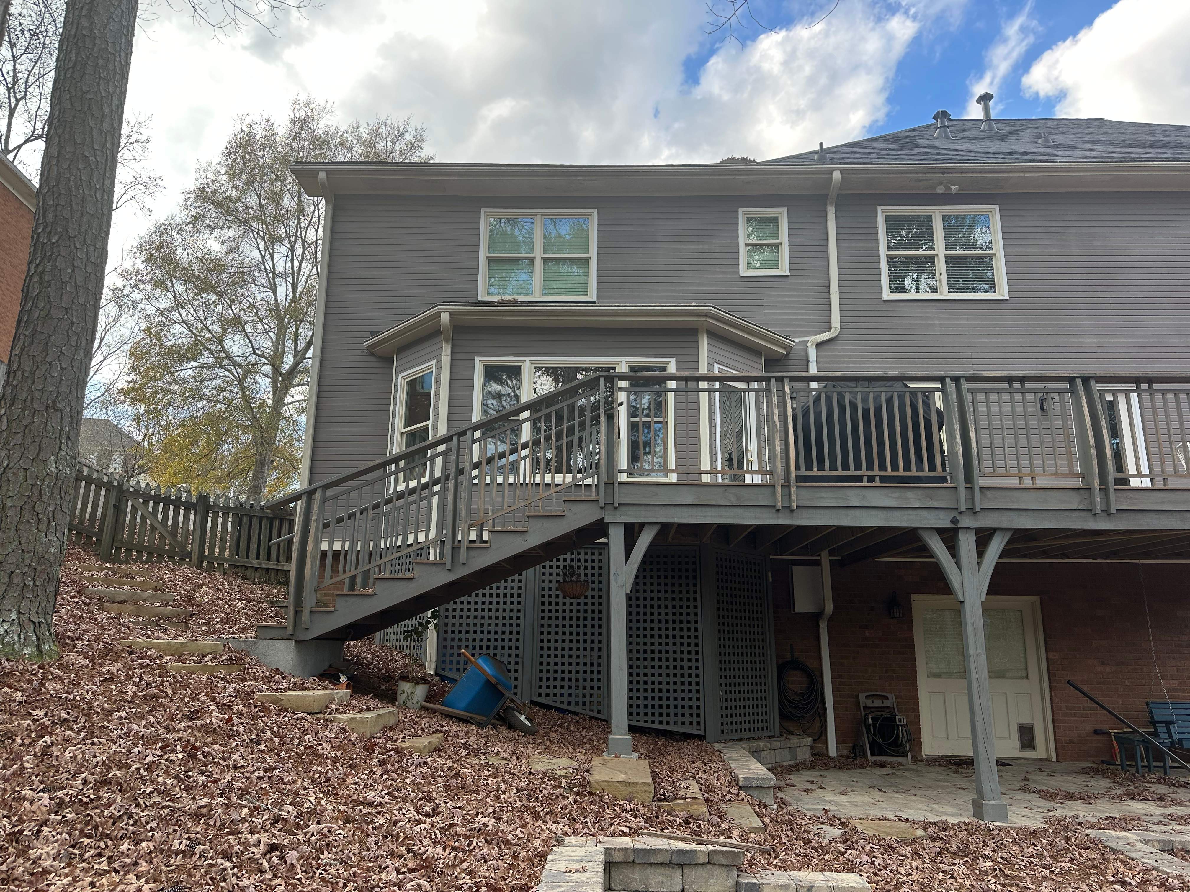 James Hardie Siding Replacement, Exterior Painting, Deck Stain, and Gutter Installation in Peachtree Corners, GA by Nelson Exteriors