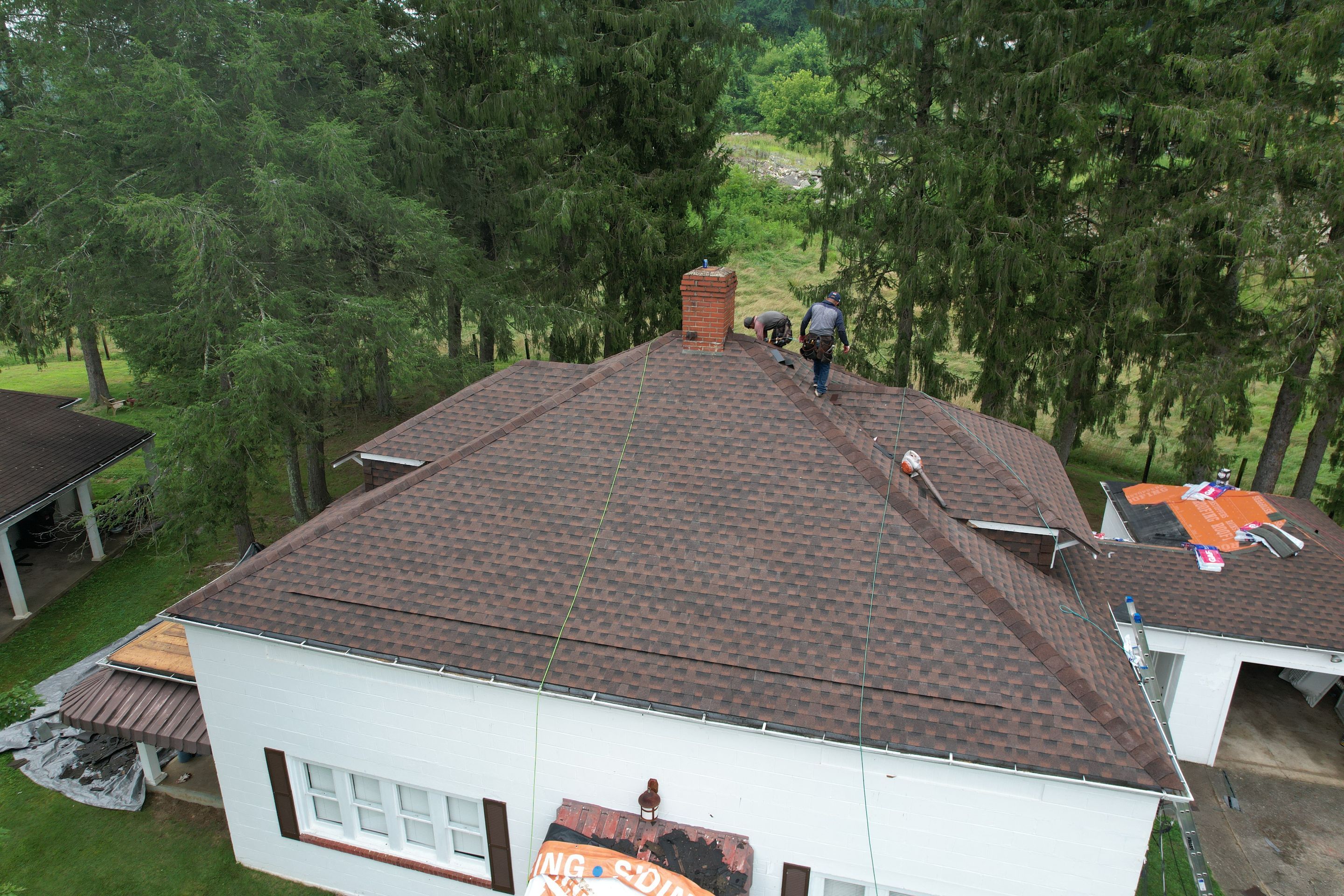 Residential Roofing Installation using GAF TImberline HDZ Hickory by Rainstoppers Roofing