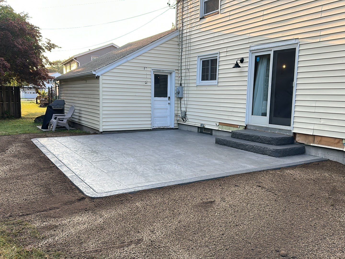 York Bluestone stamped patio by NG Masonry & Construction LLC