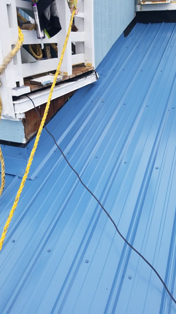 Commercial Roofing Installation using Metal roofing by American Roofing & Construction LLC