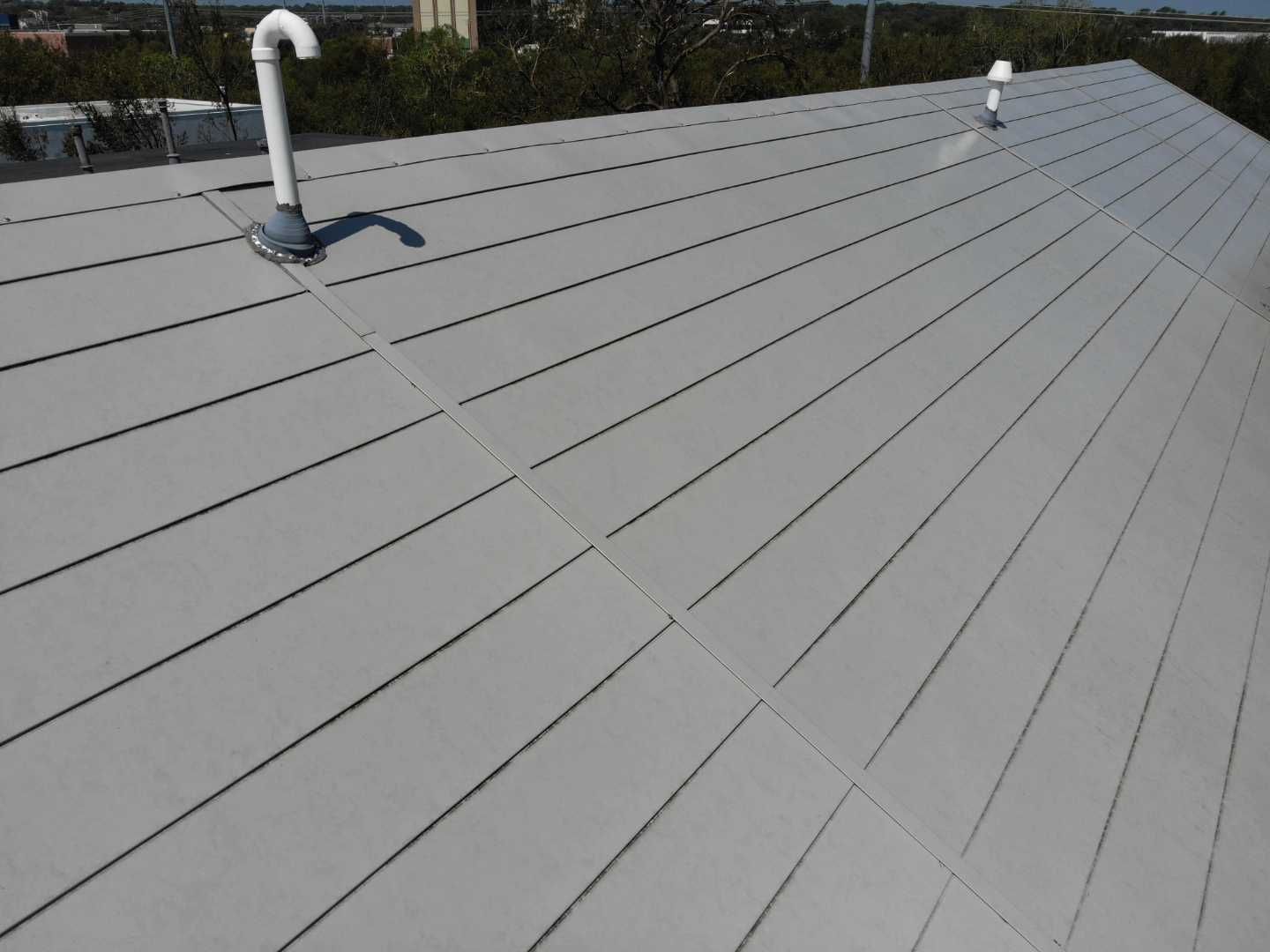 Metal Roofing project using MBCI Flexloc Panels - 22 gauge - silver metallic-in-color by Becker Roofing and Exteriors
