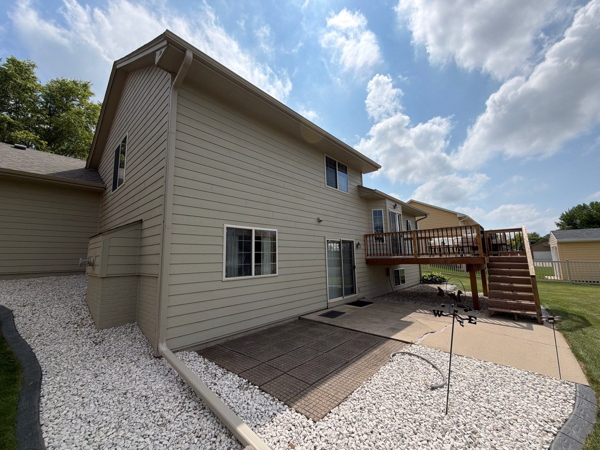 Residential Exterior Painting and Siding Refresh in Sioux Falls by Select Painting, Coatings & Garage Cabinets