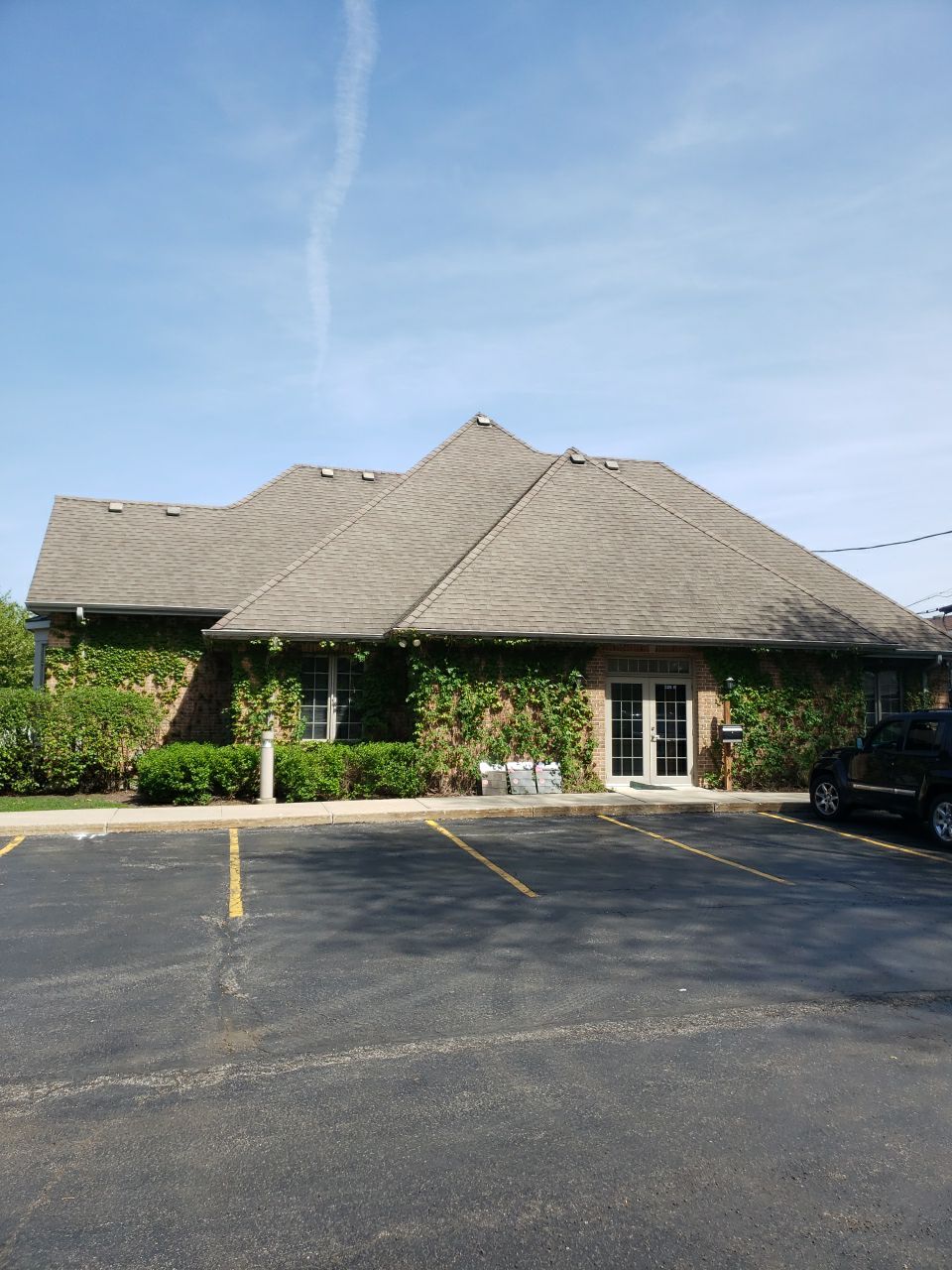 Asphalt Roof Replacement and Aluminum Gutter Installment  by Custom Installations