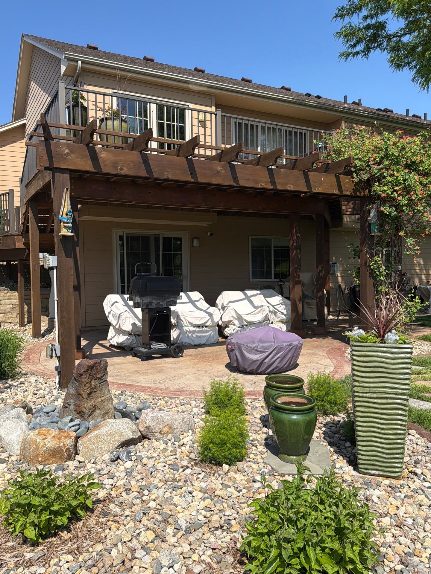 Tiered Wood Deck and Pergola Refinishing in Sioux Falls by Select Painting, Coatings & Garage Cabinets