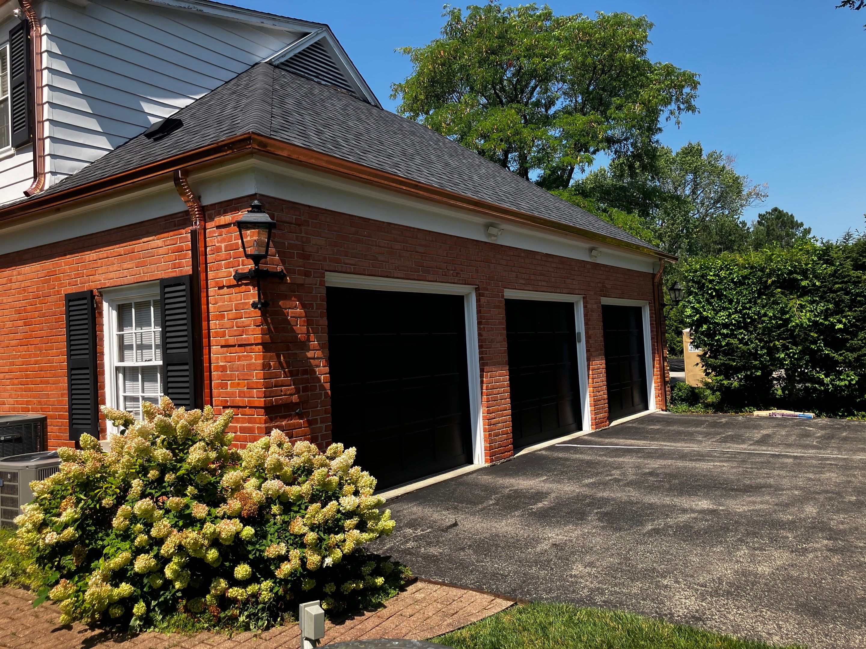 Flat Roof Replacement and Copper Gutter Installation by Custom Installations