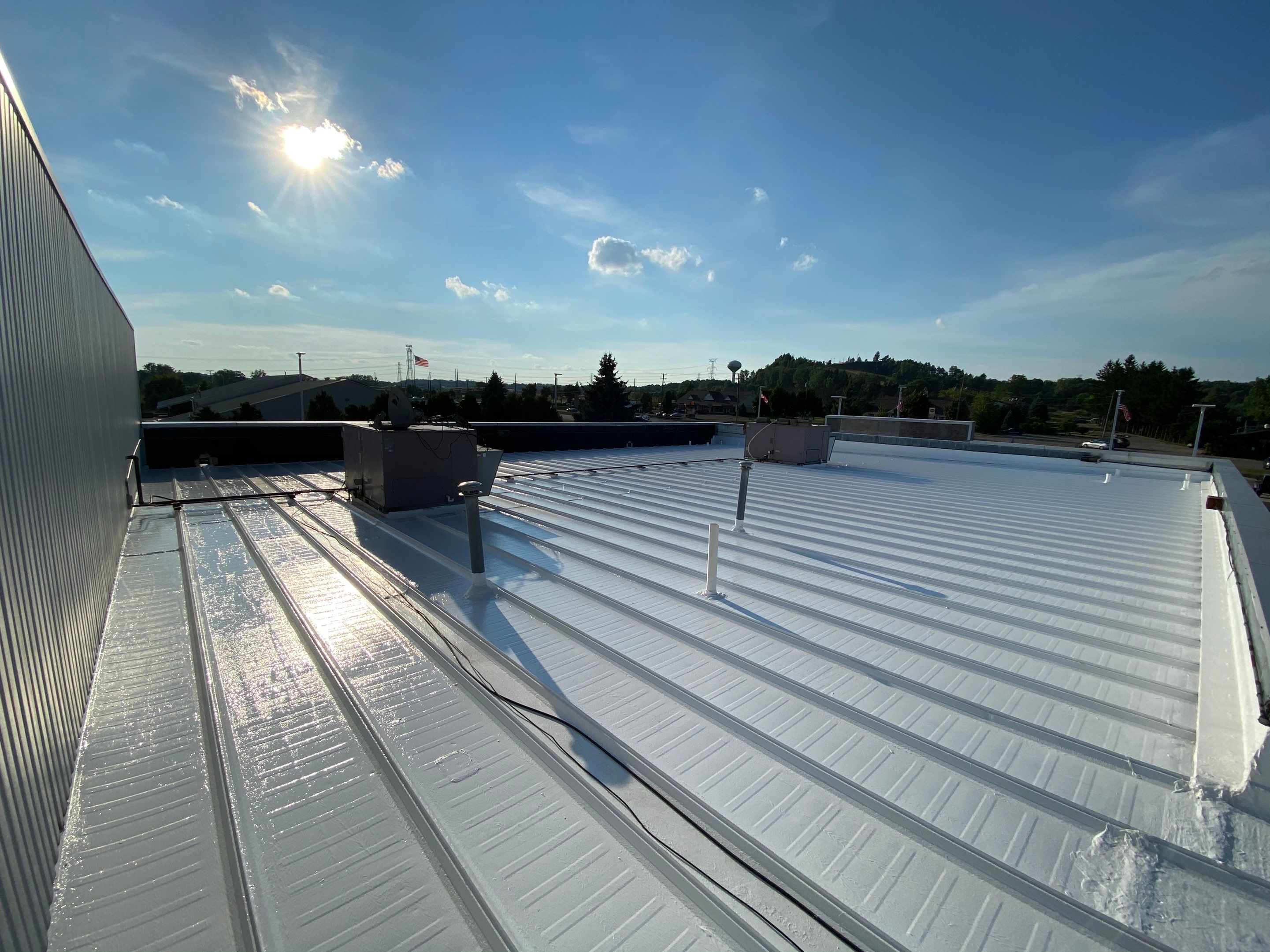  Car Dealership - Commercial  Roof Coating by Bloomfield Construction & Restoration