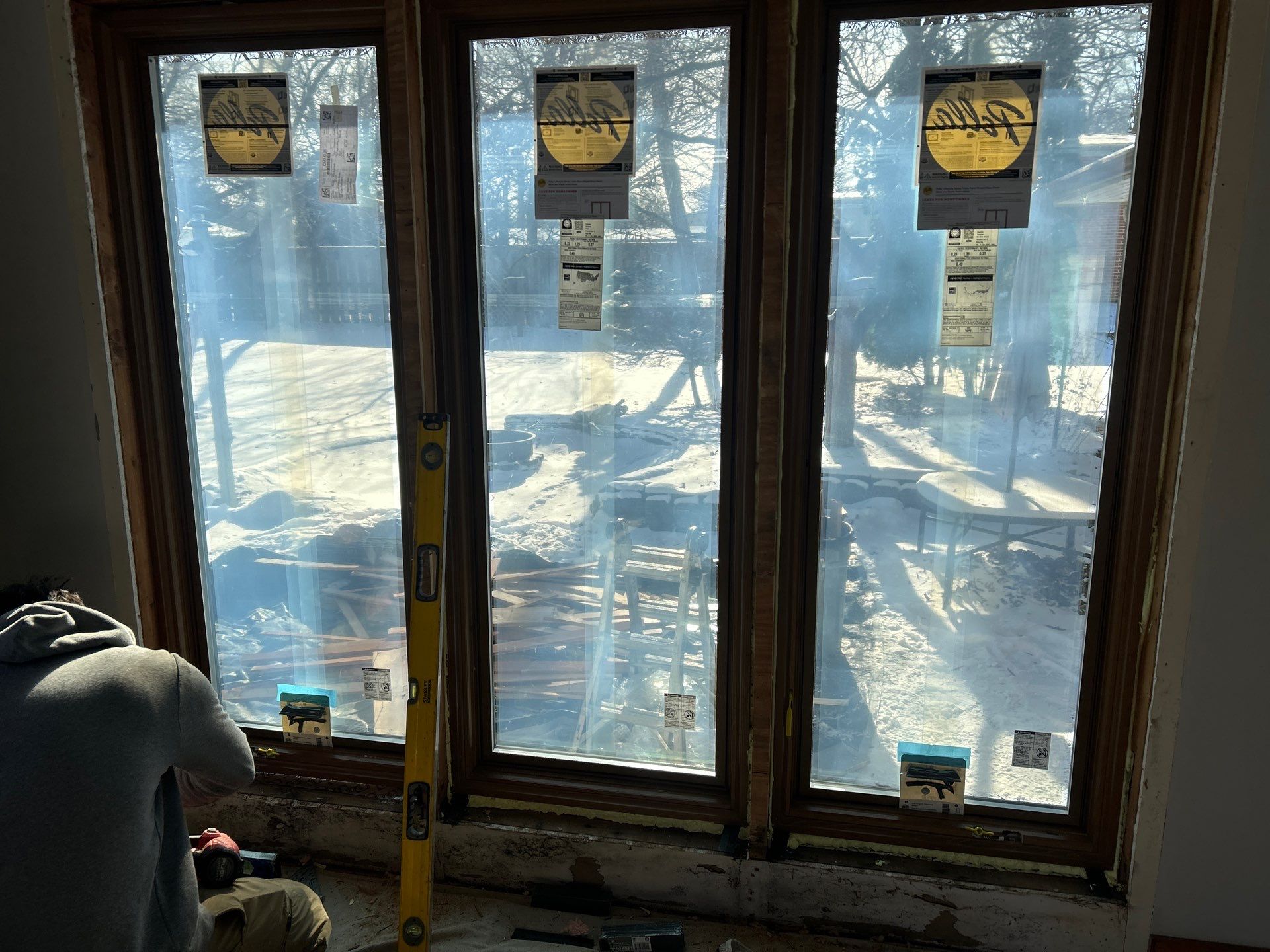 Black-Frame Pella Lifestyle Upgrade on a Partial Brick Home by United Windows and Siding LLC