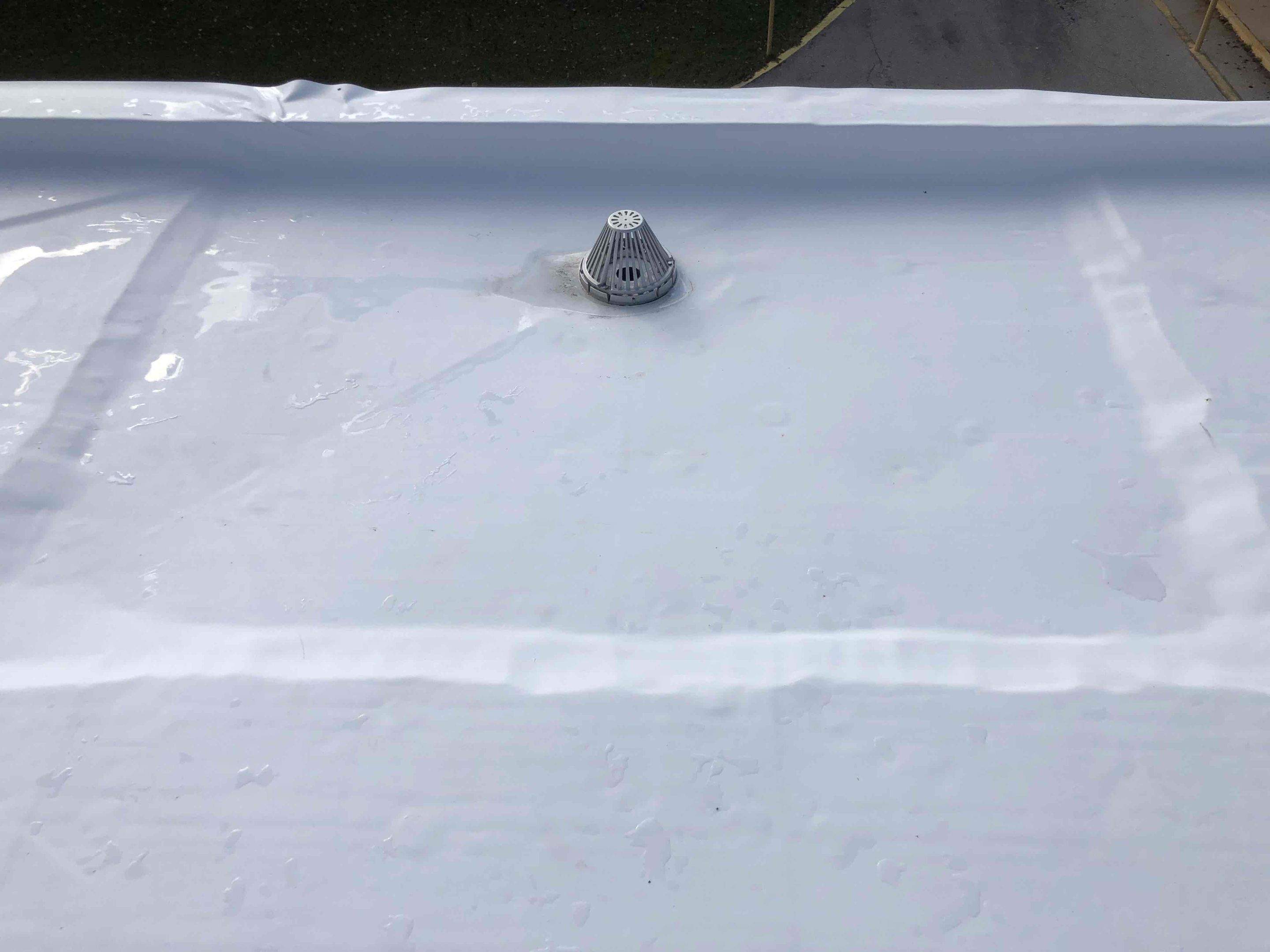 Roof Installation using Silicone TPO by ExteriorPros