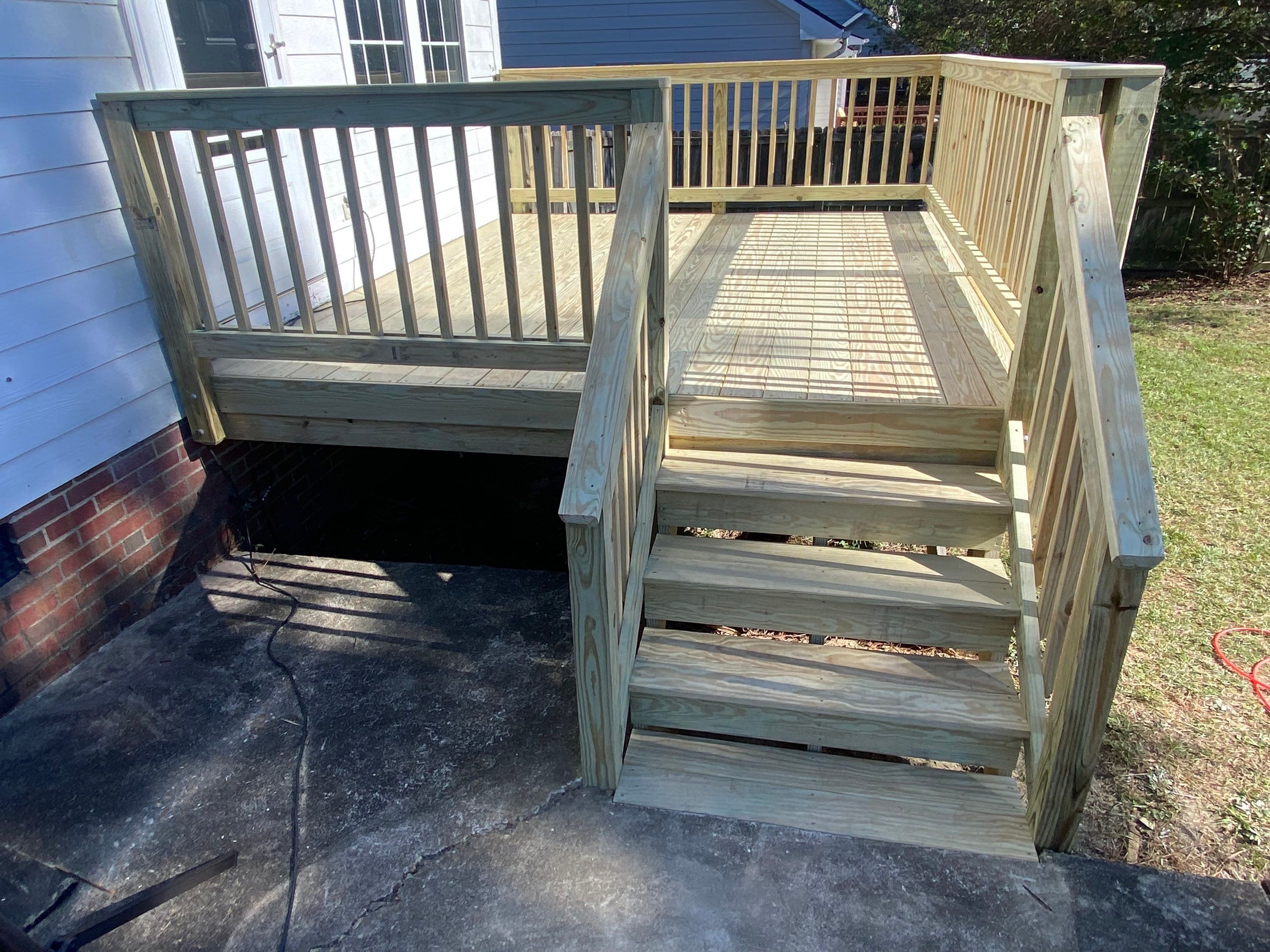 Full Deck Reconstruction and Exterior Trim Restoration in Hope Mills by The Remodeling Company