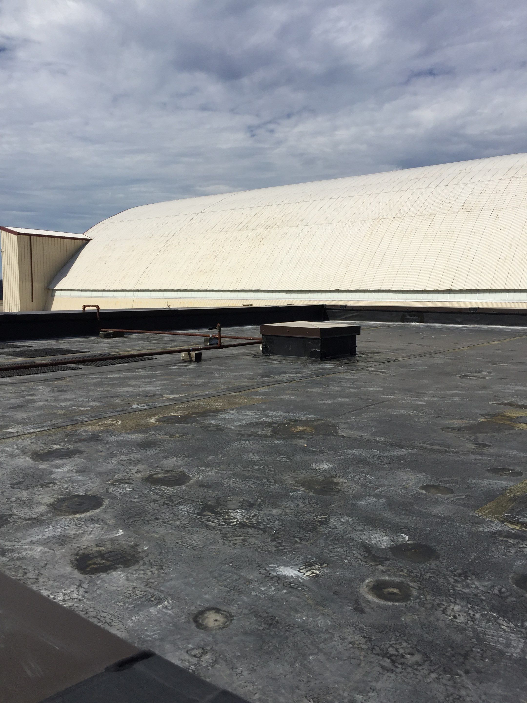 Commercial Rubber Roofing  using Carlisle Rubber Roofing System by Secure Construction Company Inc