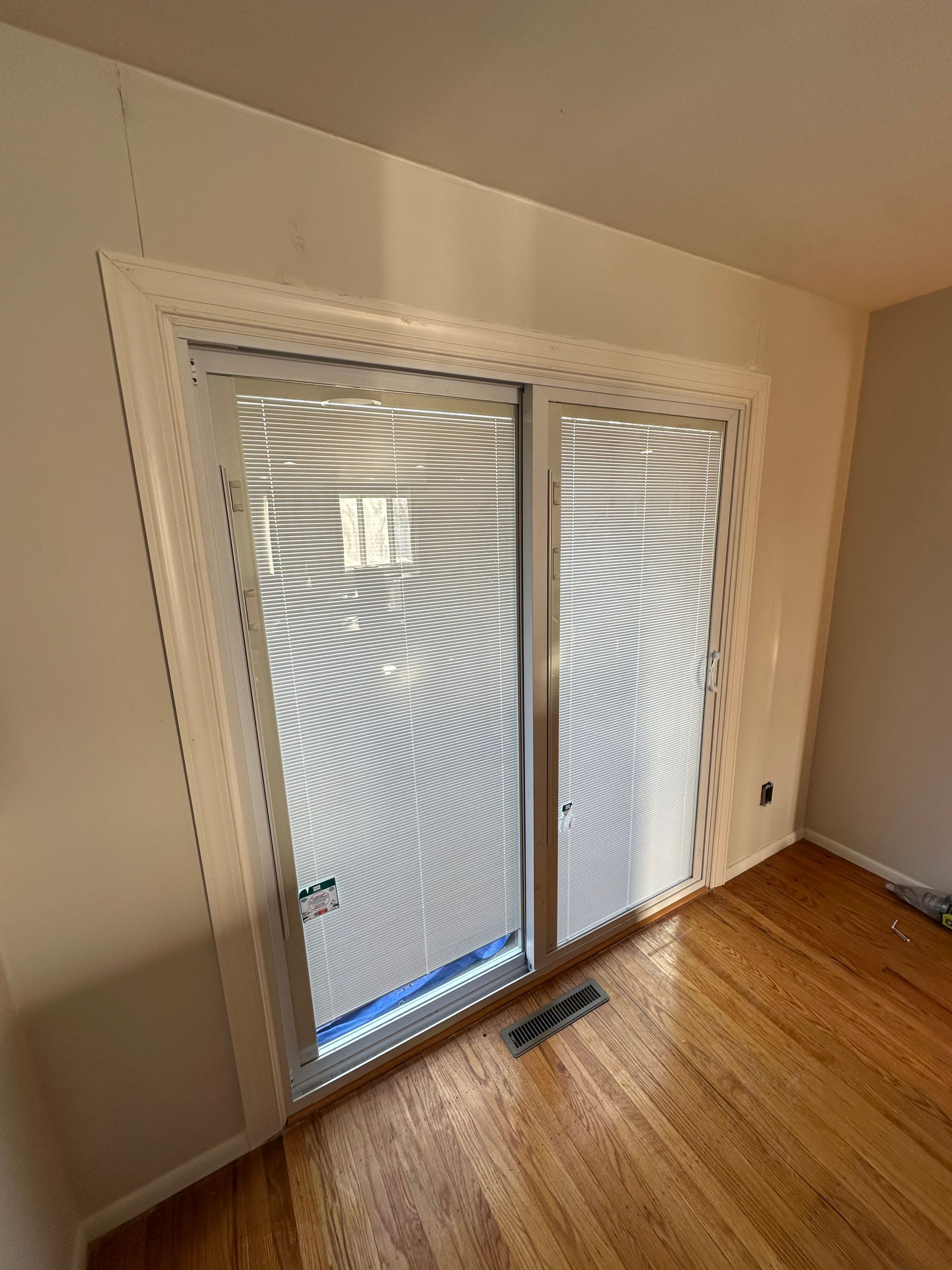 New deck construction and replacement of window with new sliding door  by deck guardian