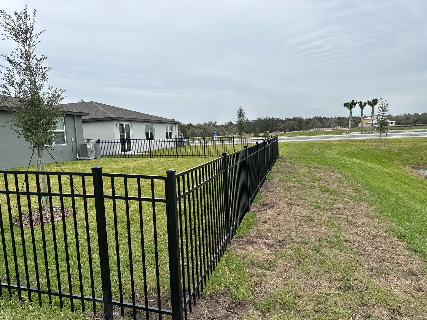 Aluminum Fence Installation using Black 3 Rail Aluminum Fence by Asap fence and gates, LLC