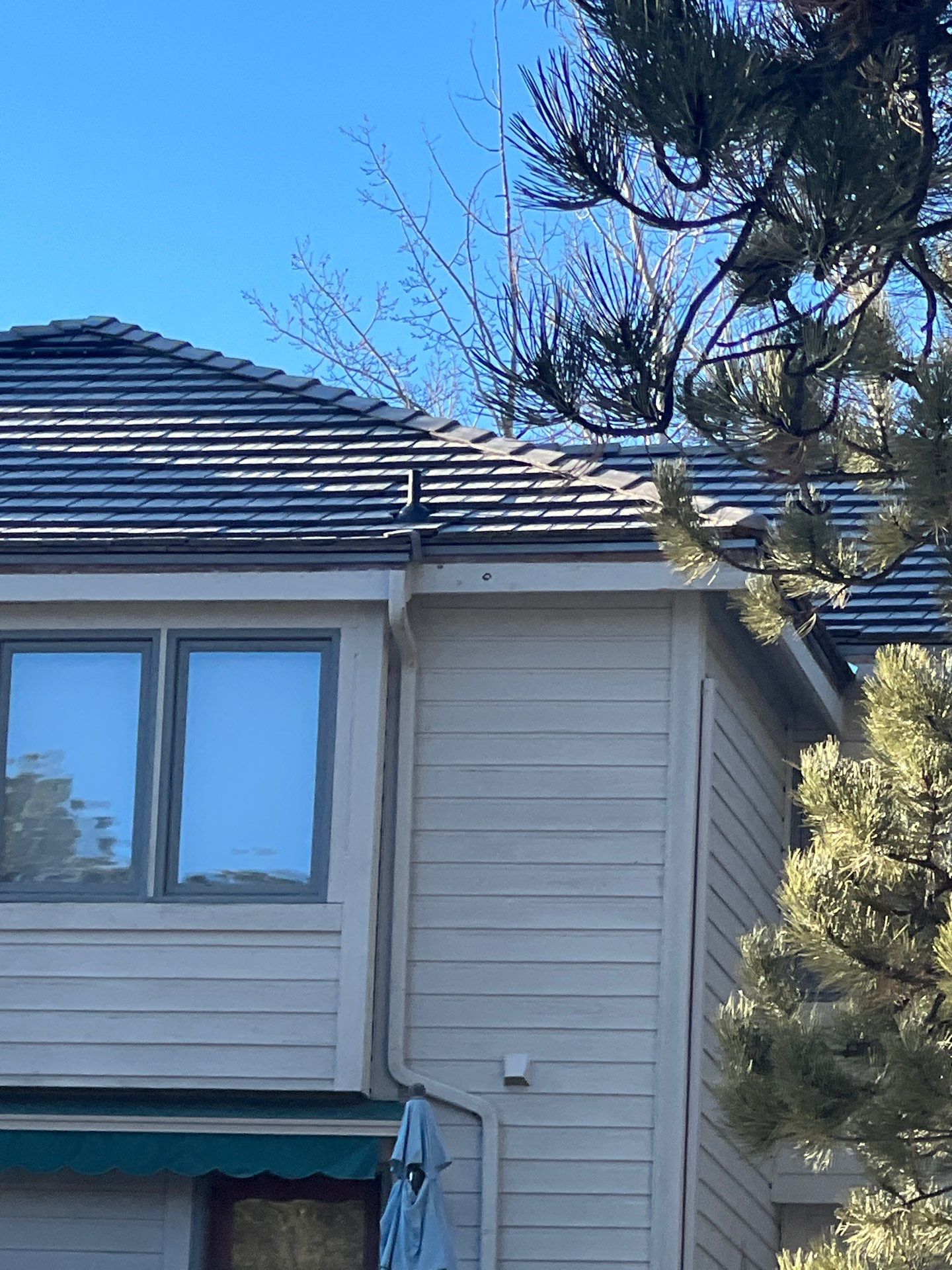 Residential Roofing Installation using Concrete Tile by Blue Peaks Roofing LLC 
