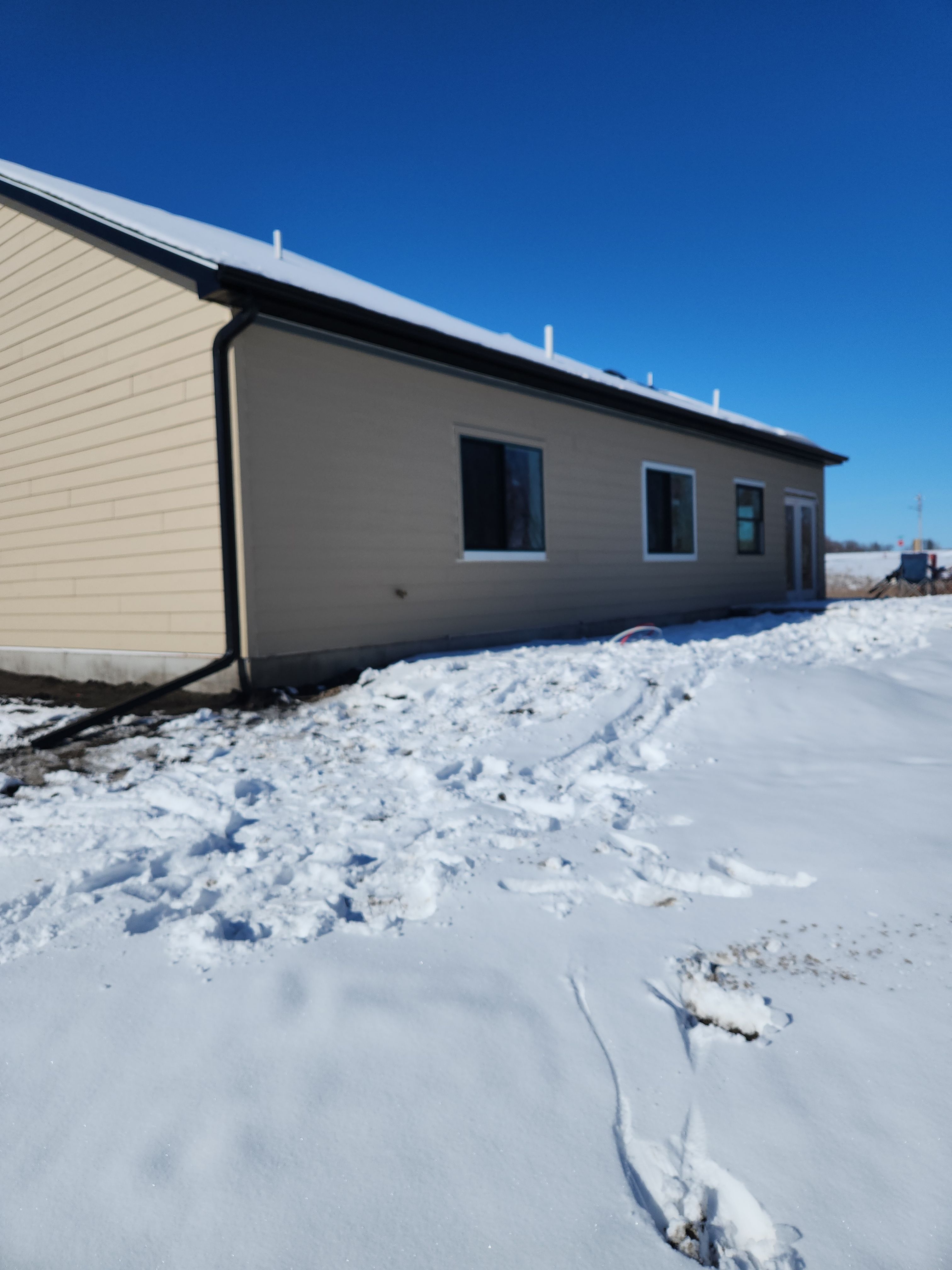 5" Gutters in Howard Lake by Next Level Seamless Gutters / Exteriors Inc.