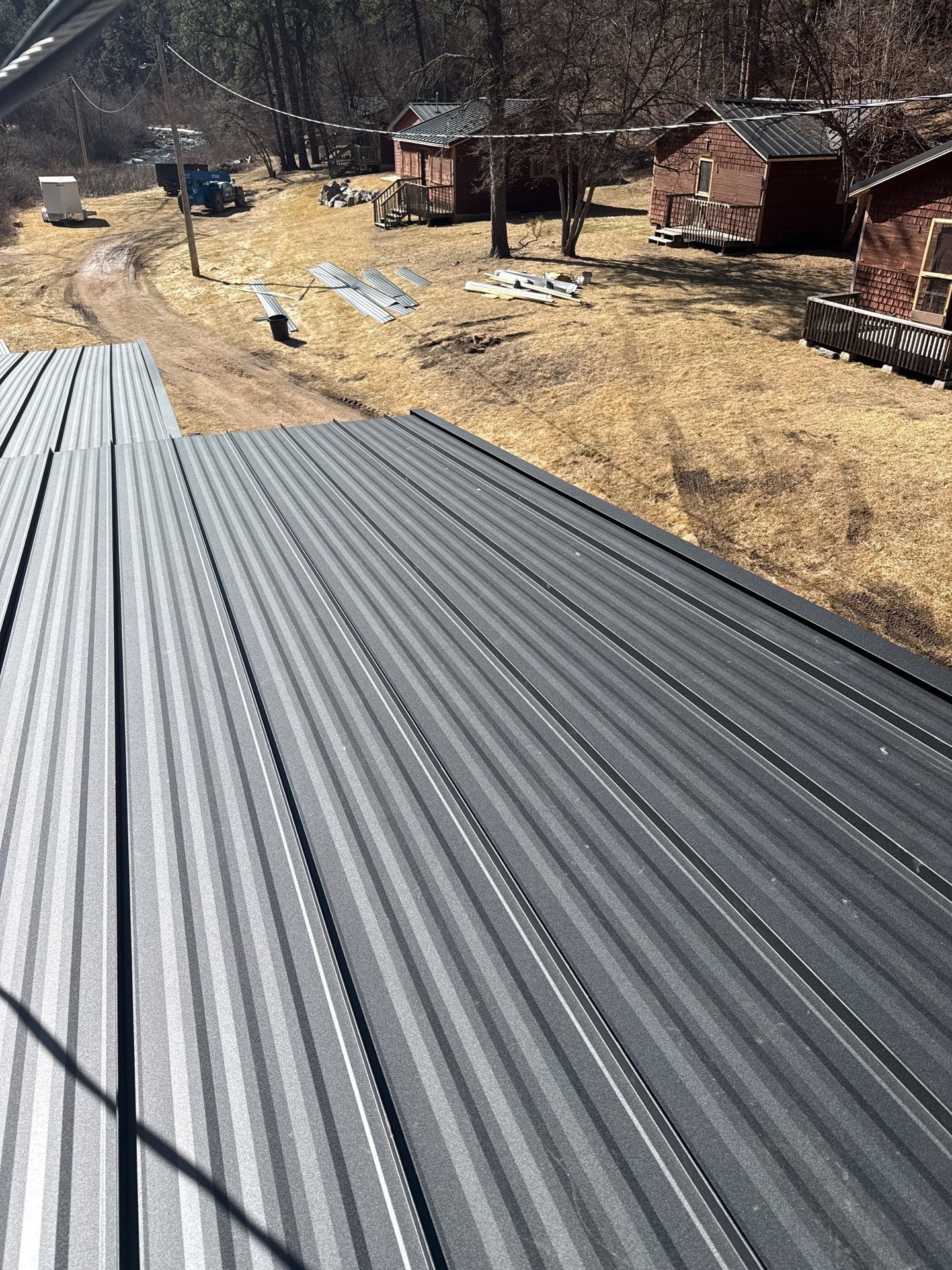 Residential Roofing Installation using Steel Roofing by Weather-Tite Exteriors LLC