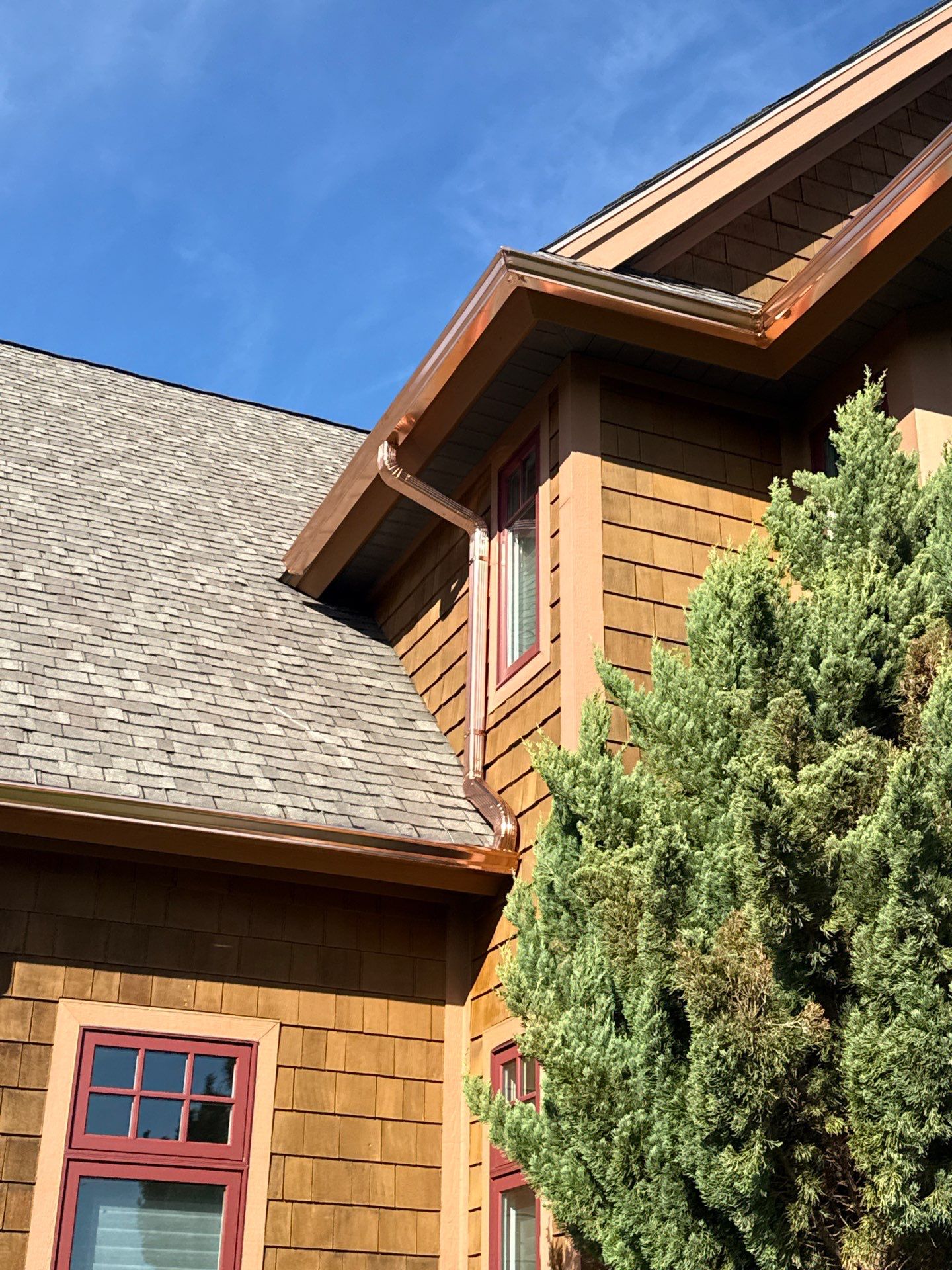Custom Copper Gutter and Metal Downspout Installation in Williamsburg by Rainbow Seamless Systems
