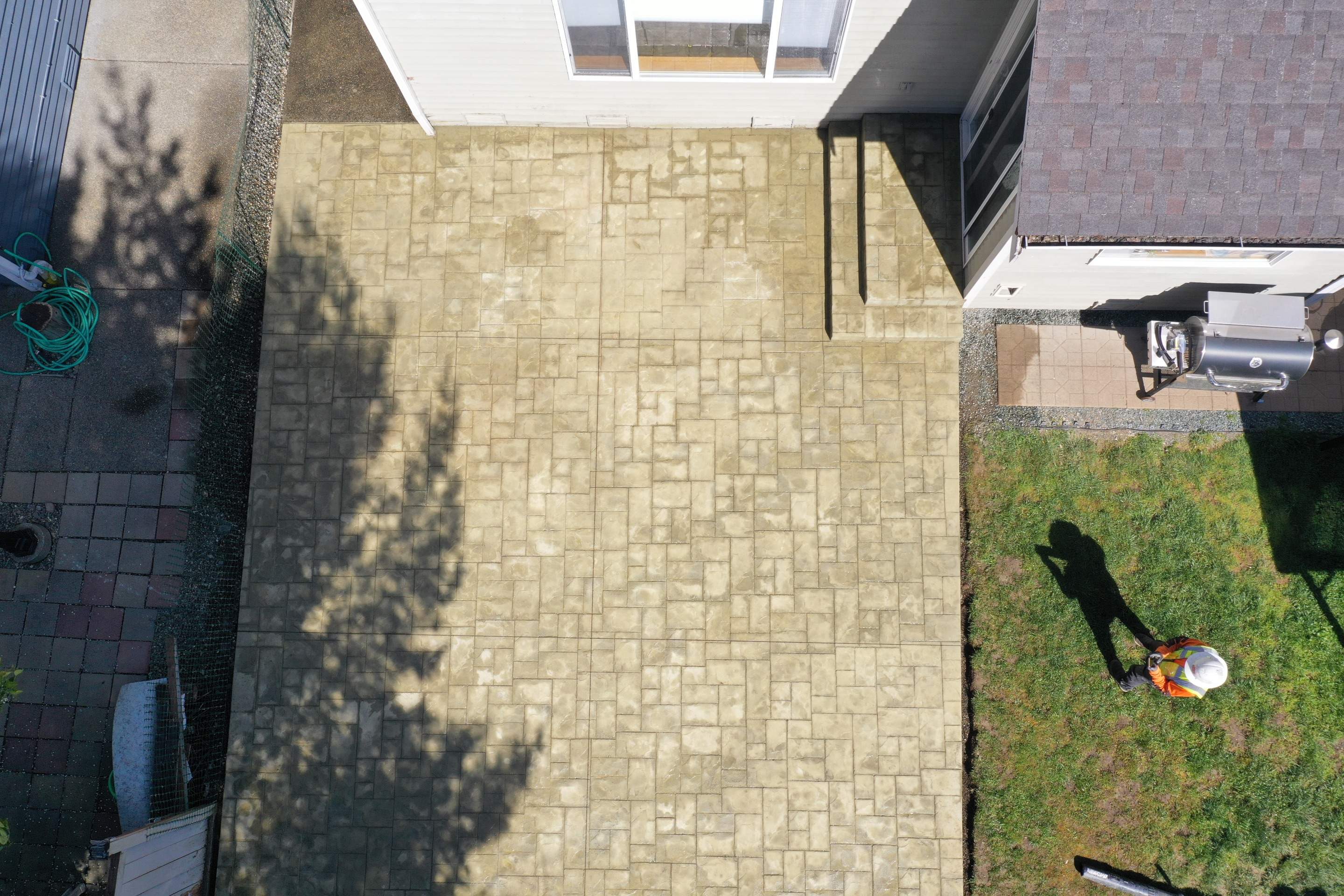 Benedict | Stamped Concrete Back Patio by Jireh Asphalt & Concrete Inc 