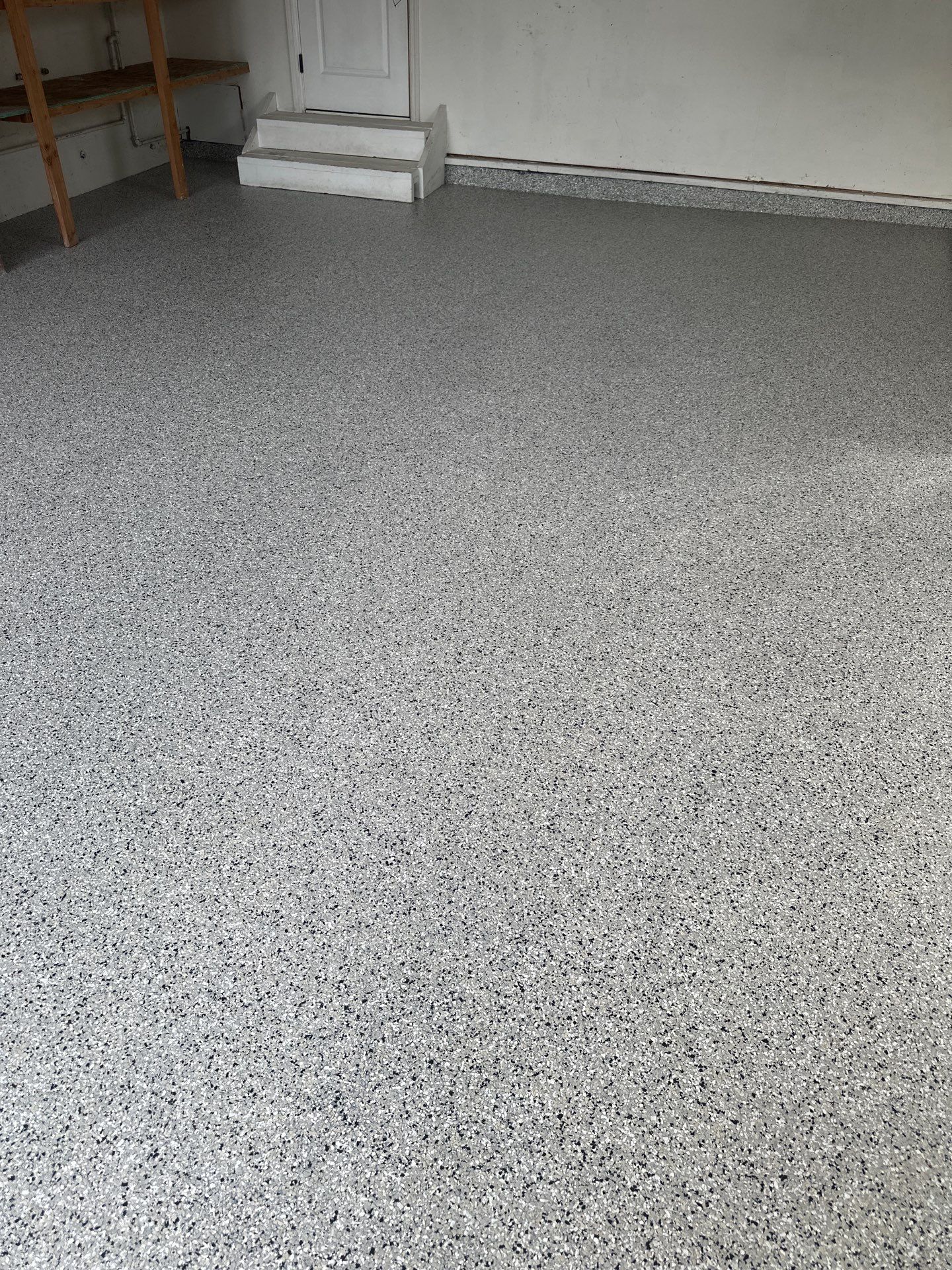 Polyurea Garage Floor Coating with Cabin Fever Decorative Chips in Cambria by MGP Coatings
