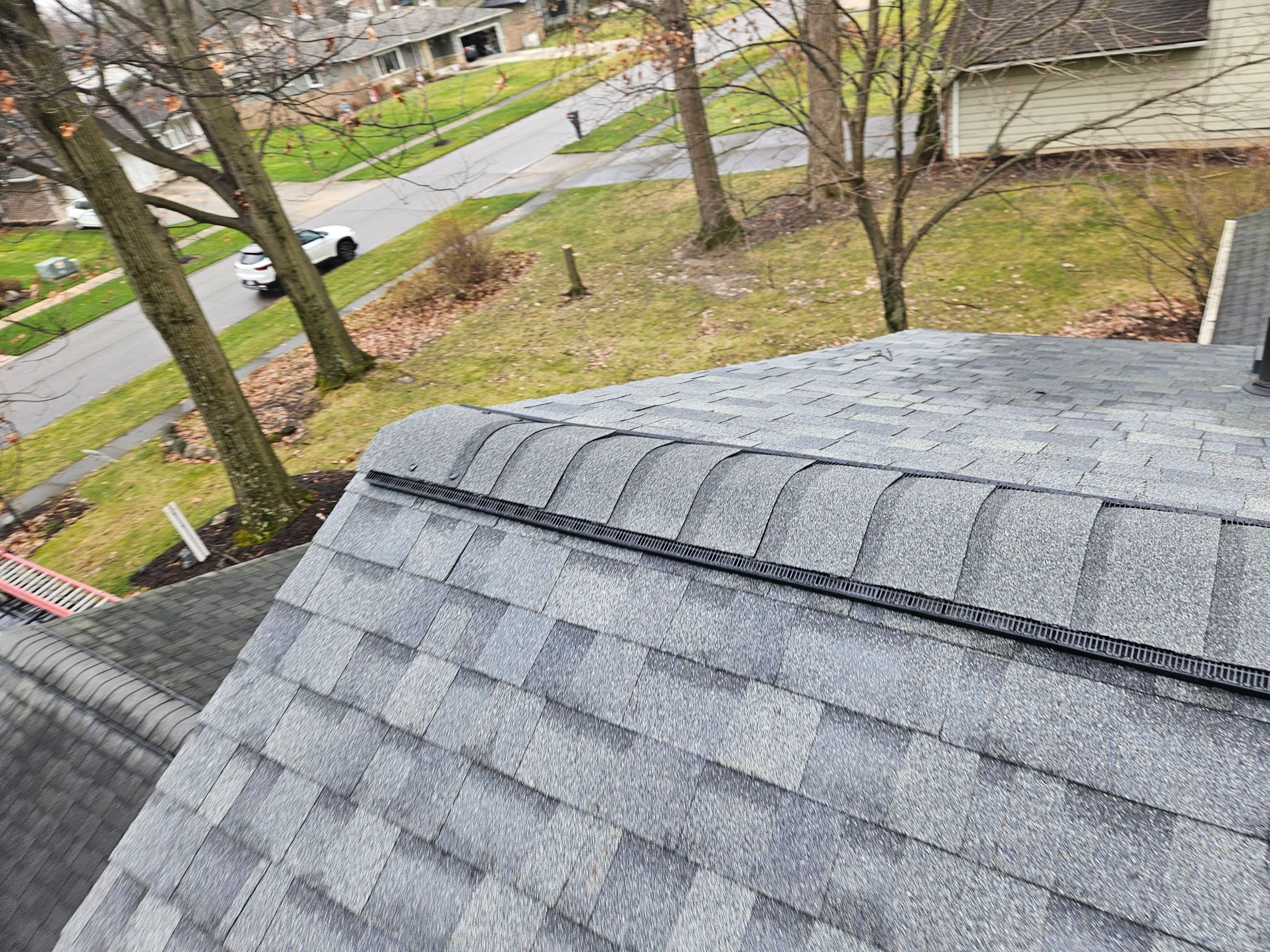 Residential Roof Replacement using Owens Corning Onyx Black by Absolute Roofing and Construction
