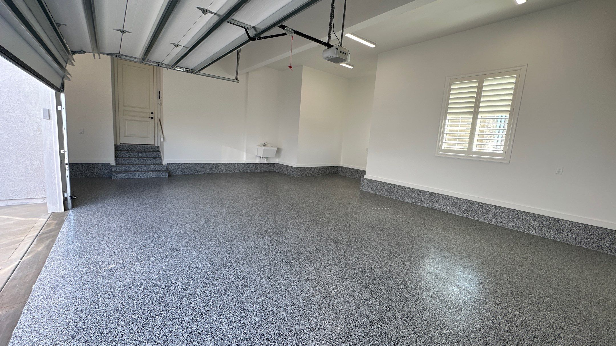 Mike & Pam transformed their garage with a Banner Garage Floor and Cabinets by Banner Garage