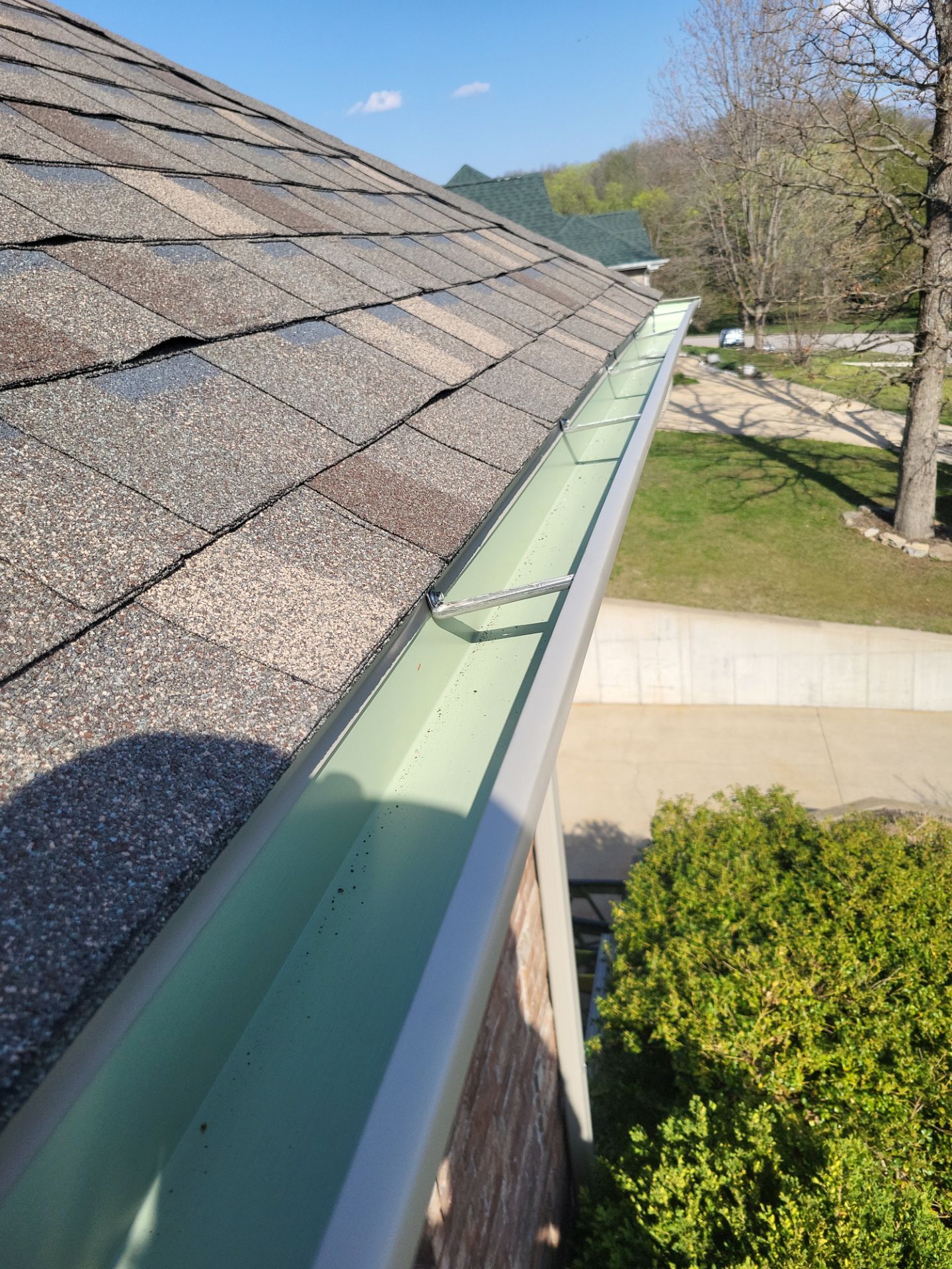 Residential Roof + Gutters & Downspouts Install  by Titan Commercial & Residential Roofing 
