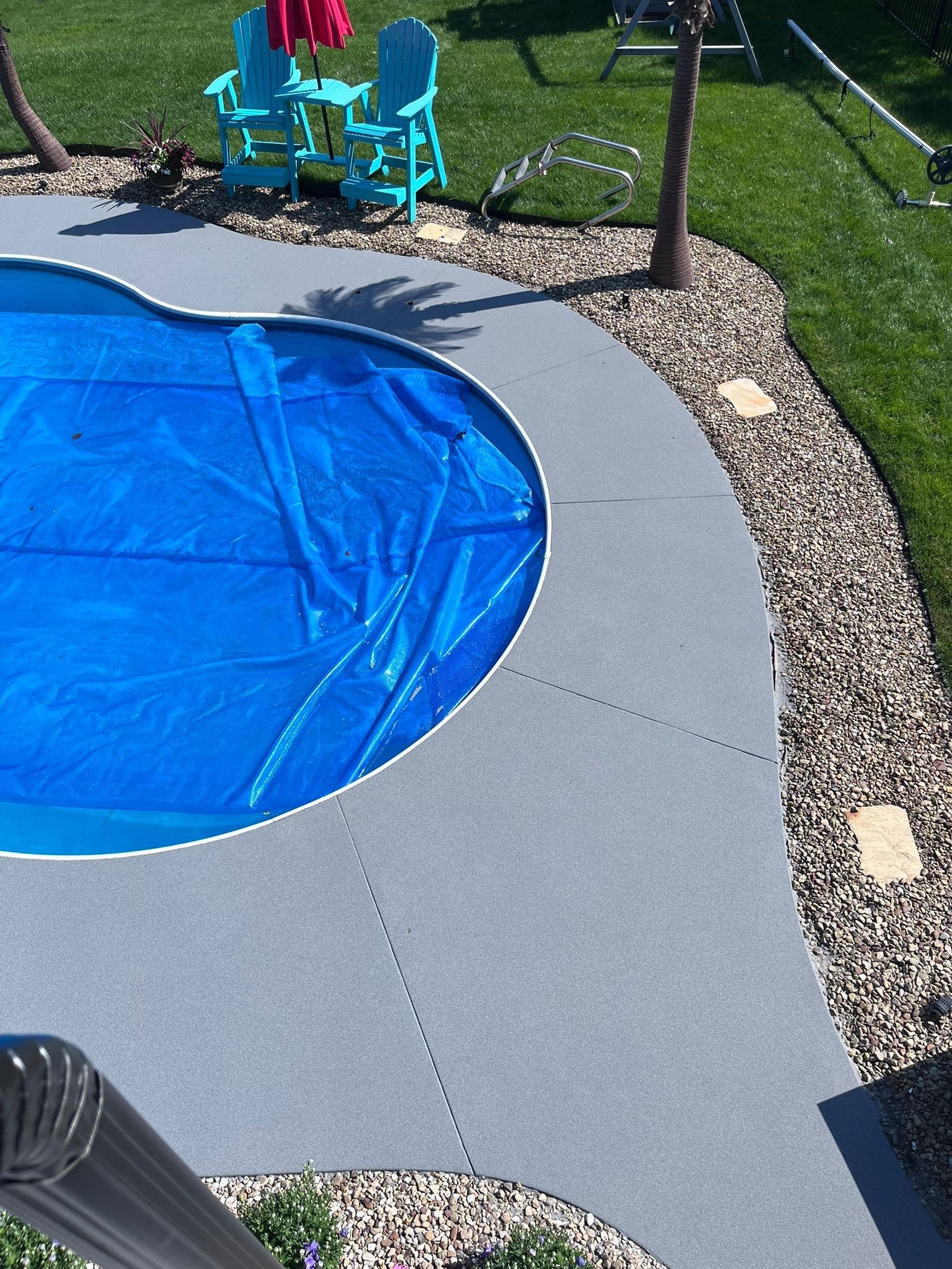 Twilight Pool Deck / Patio Project in Beaver falls by Floors in a Day, Inc