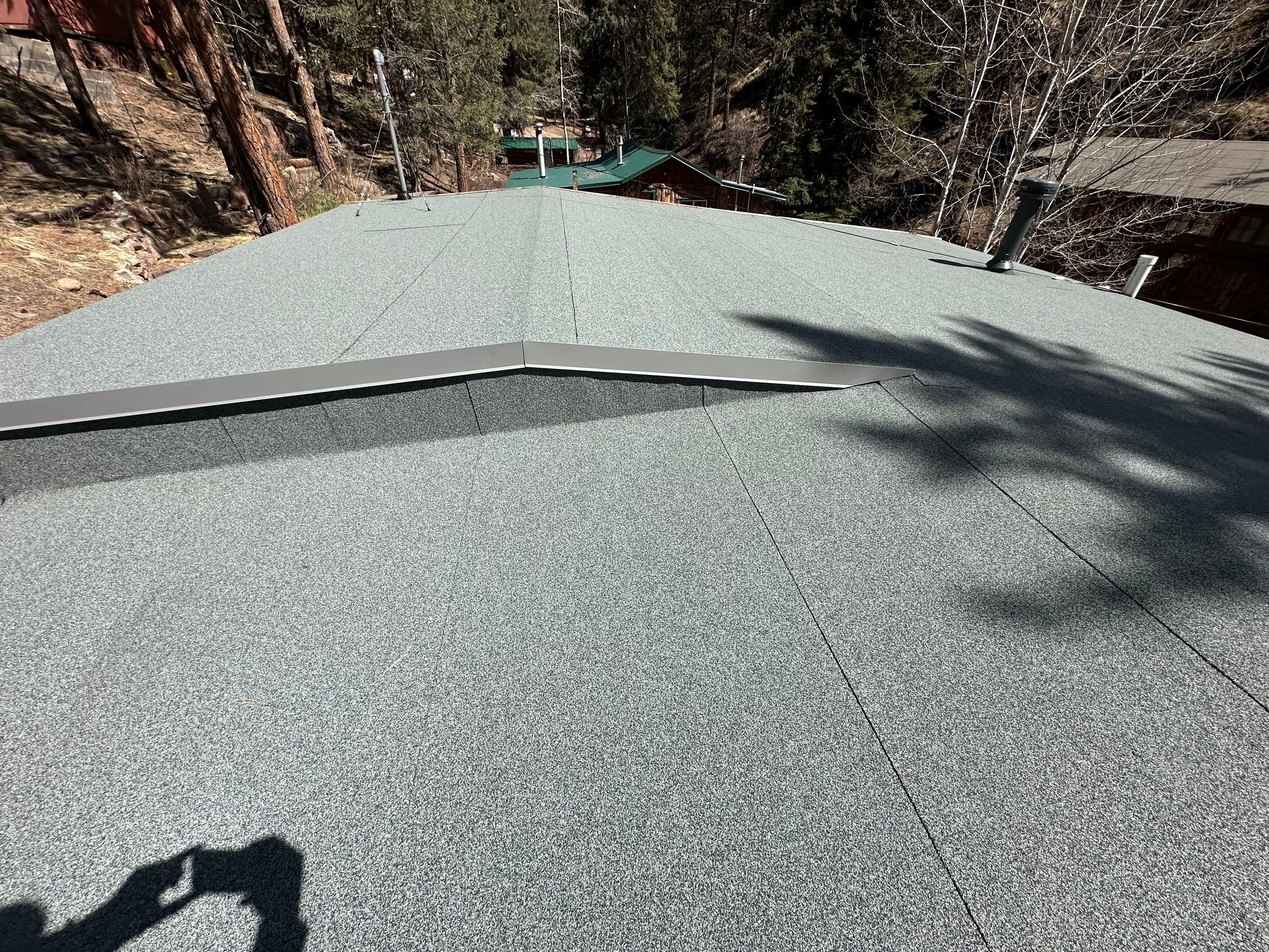 Residential Roofing Installation using Modified Bitumen Roofing by Blue Peaks Roofing LLC 