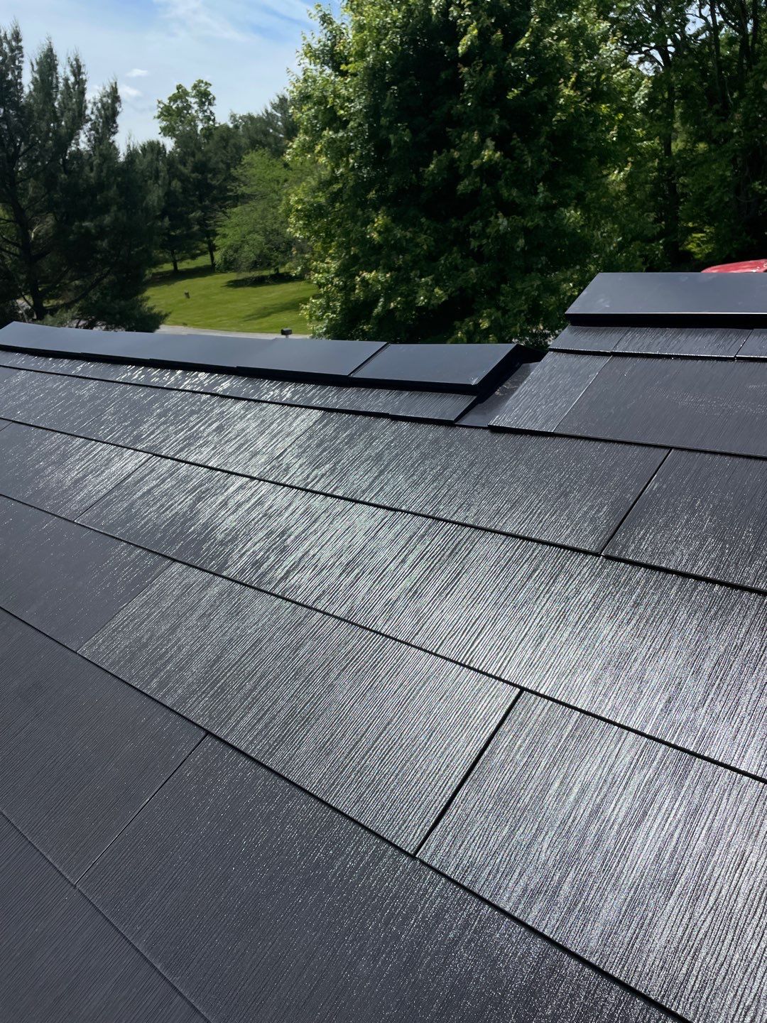 Tesla Solar Roof Installation by American Home Contractors