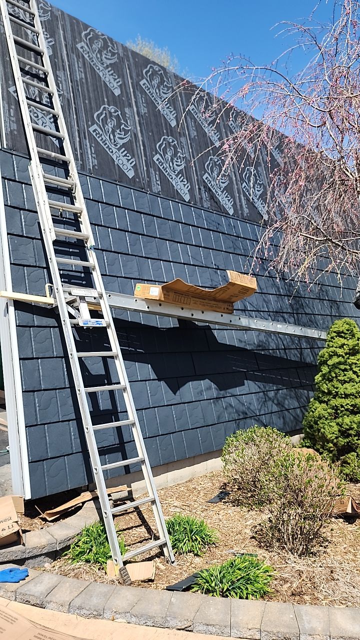 Metal Slate Shingle Roof in Sturgis, Michigan – “Darth Vader Helmet” Home by 4Ever Metal Roofing
