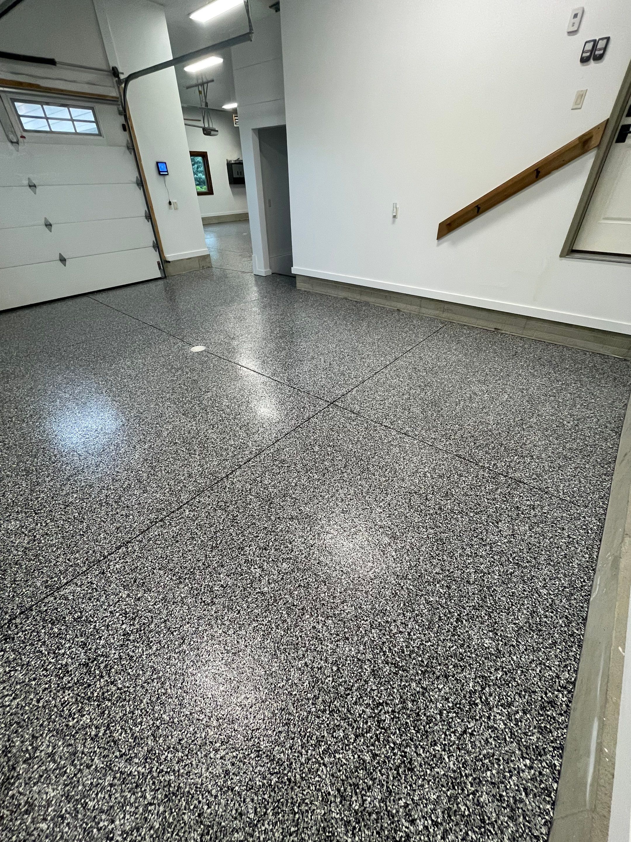 Garage Floor Coating and Domino Flake Finish in Sioux Falls by Select Painting, Coatings & Garage Cabinets