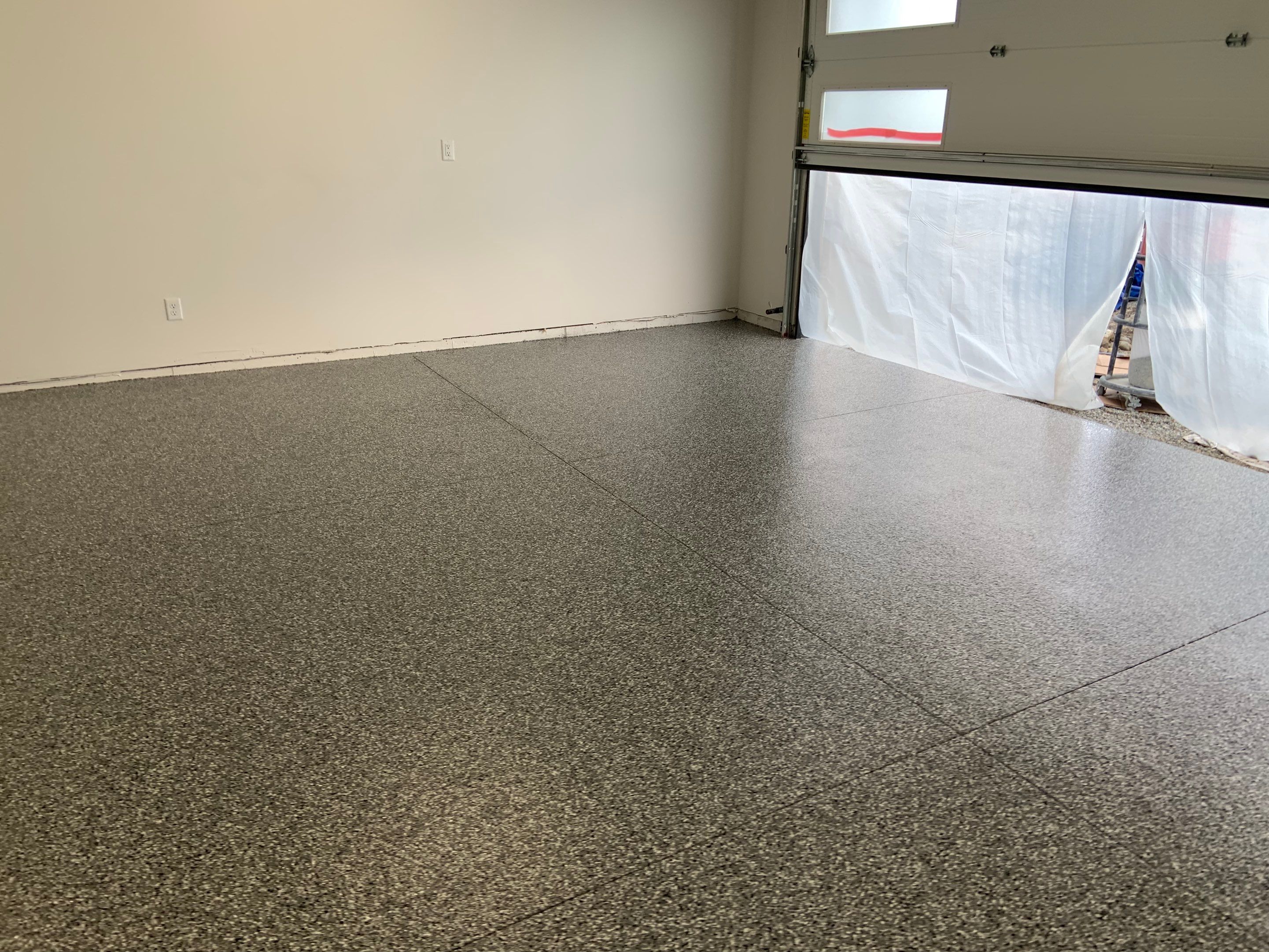 Garage Transformation using Smoke by Croc Coatings, LLC