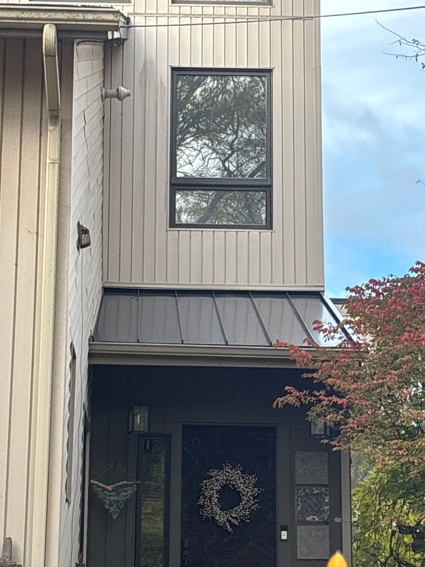 New Shingle Roof with Metal roof accents by Bloomfield Construction & Restoration