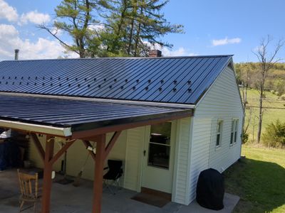 Black ABM Metal Roof Replacement