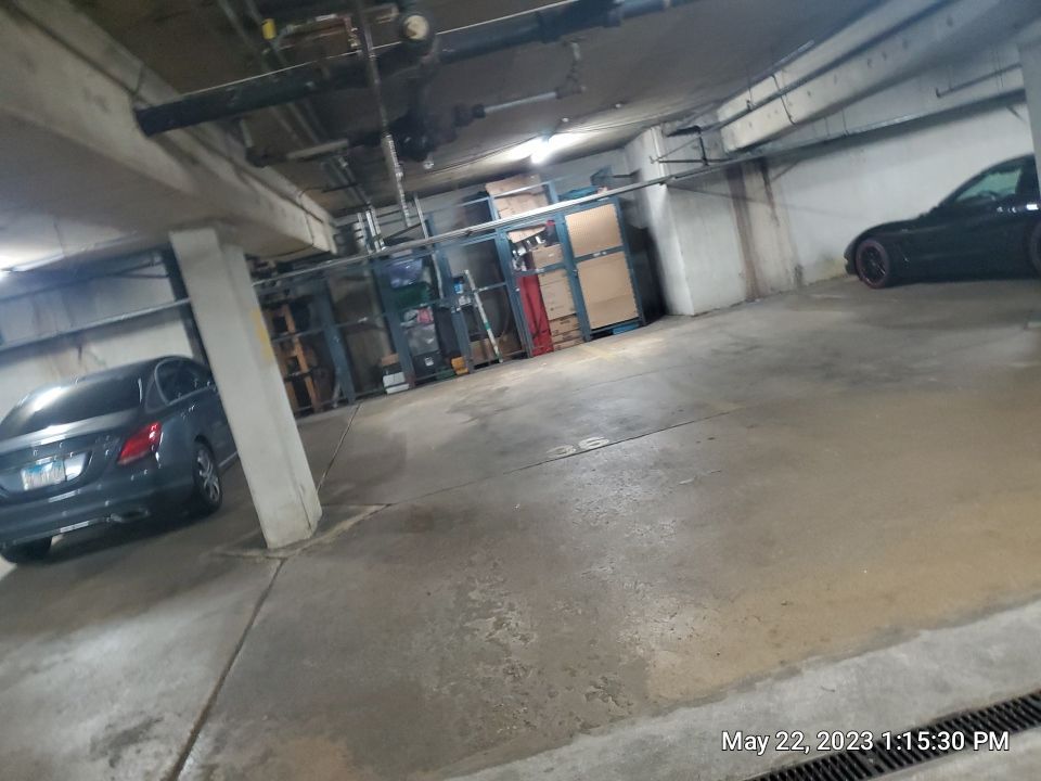 Parking garage using Hot water by Northern Power Washing LLC.