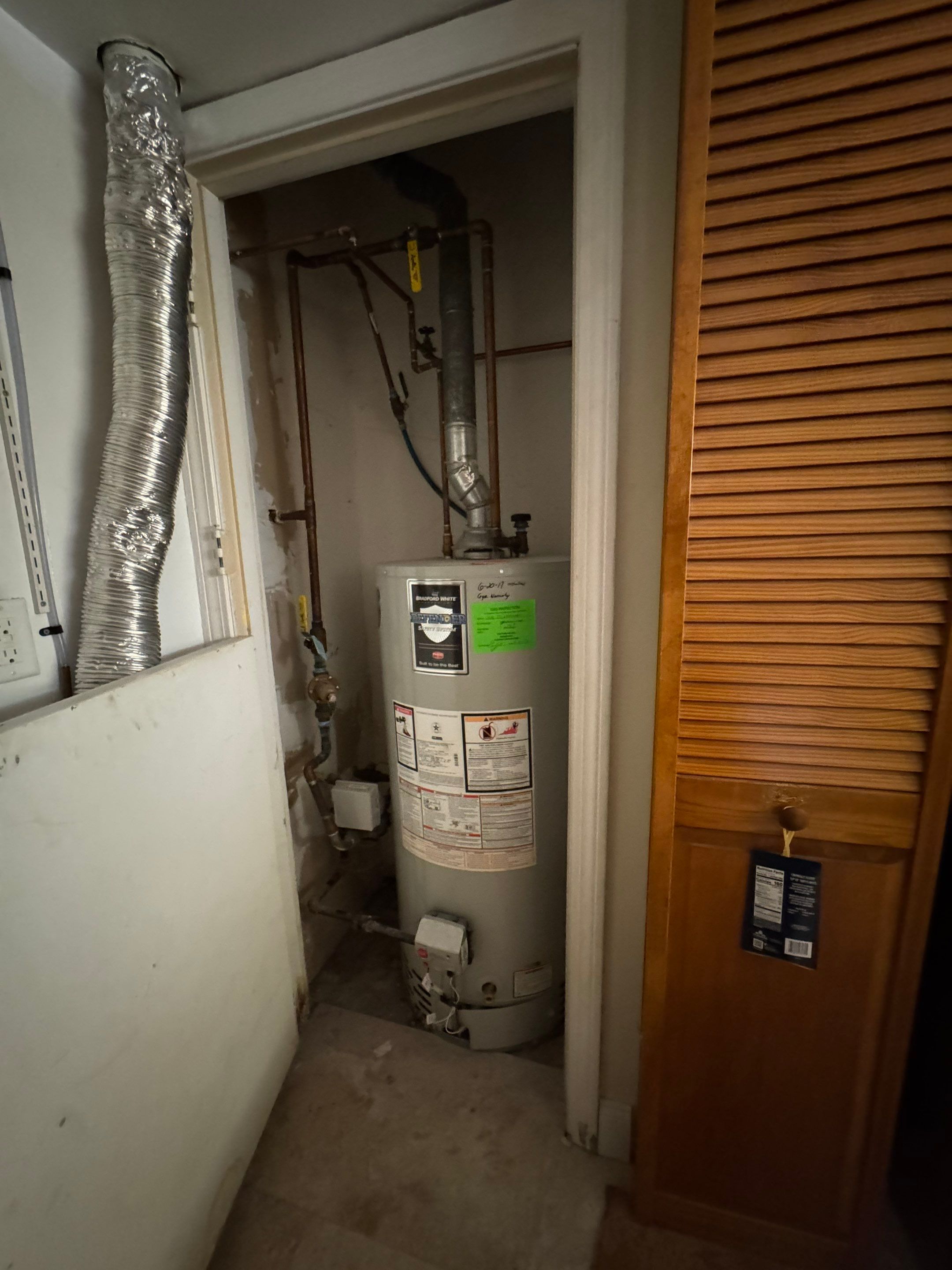 Closet Water Heater Replacement by Stake Plumbing and Heating