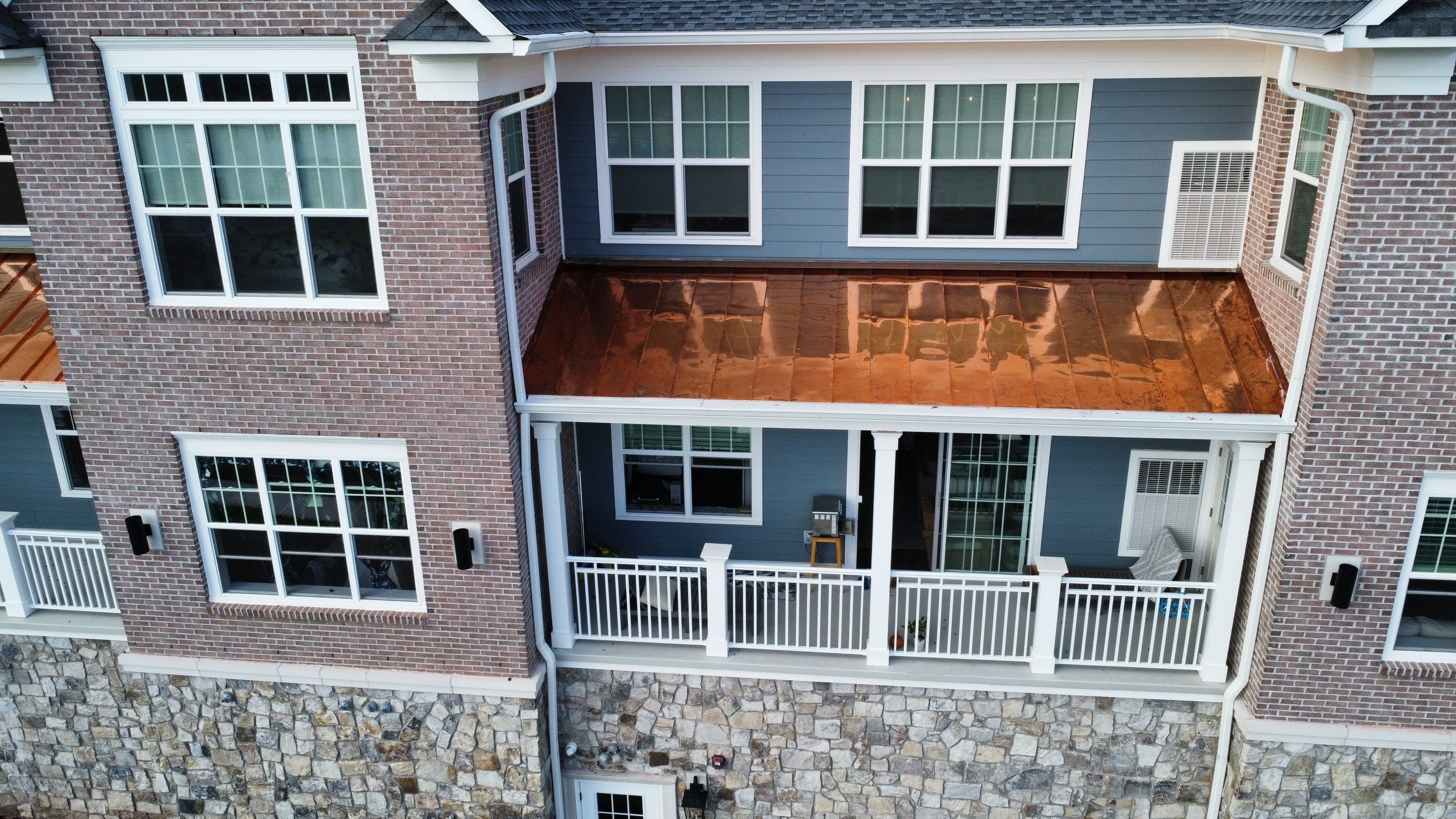 Standing Seam Metal Roof using Copper by CMNG LLC