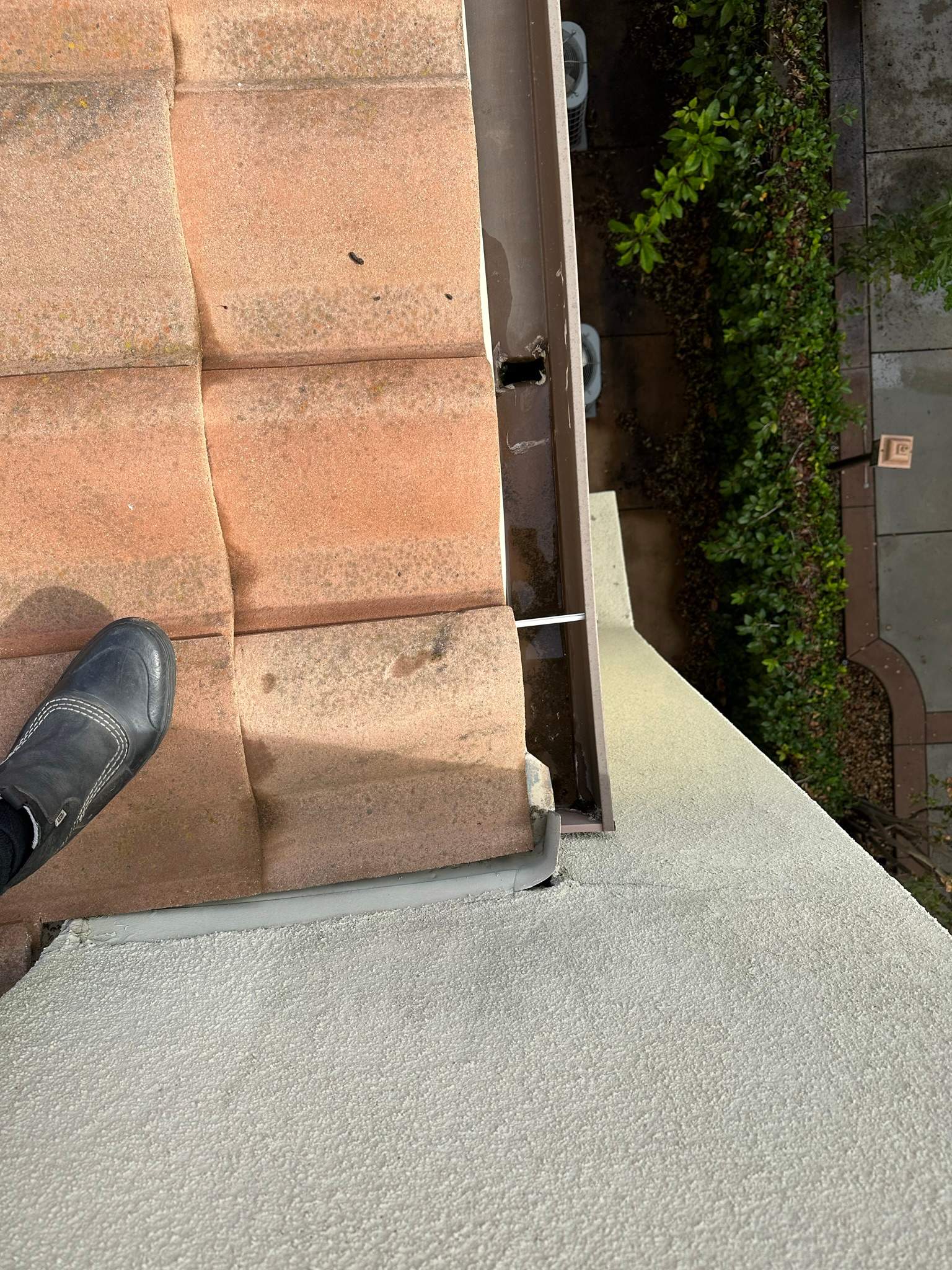 Clogged gutters at this Irvine home in Woodbury by Property Cleaning Experts, LLC