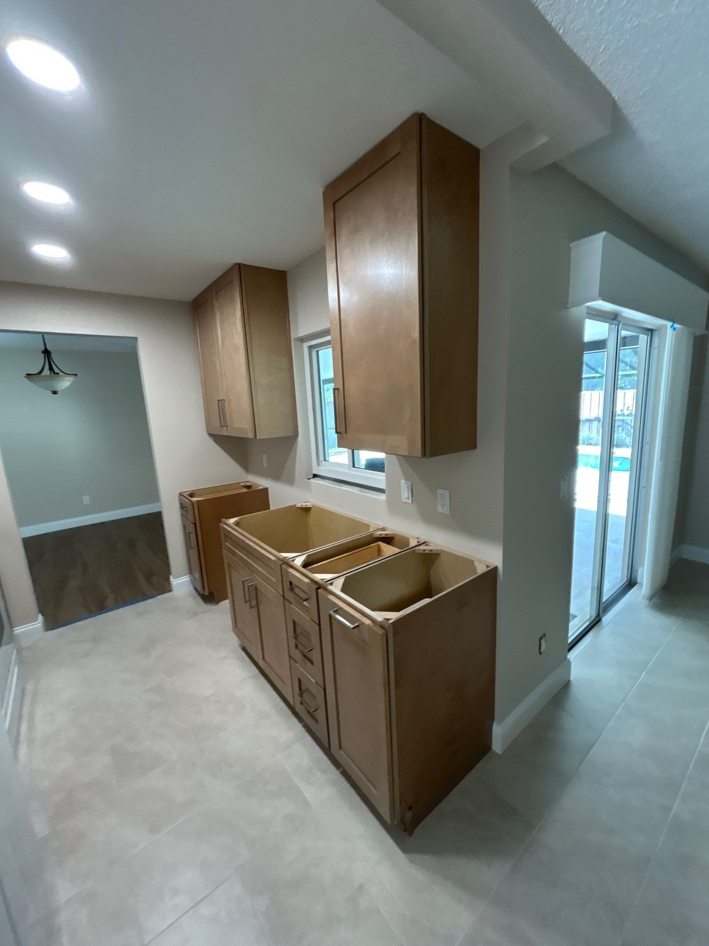 New Sandstone Cabinets with Quartz by Kitchen Tune-Up Lake Mary