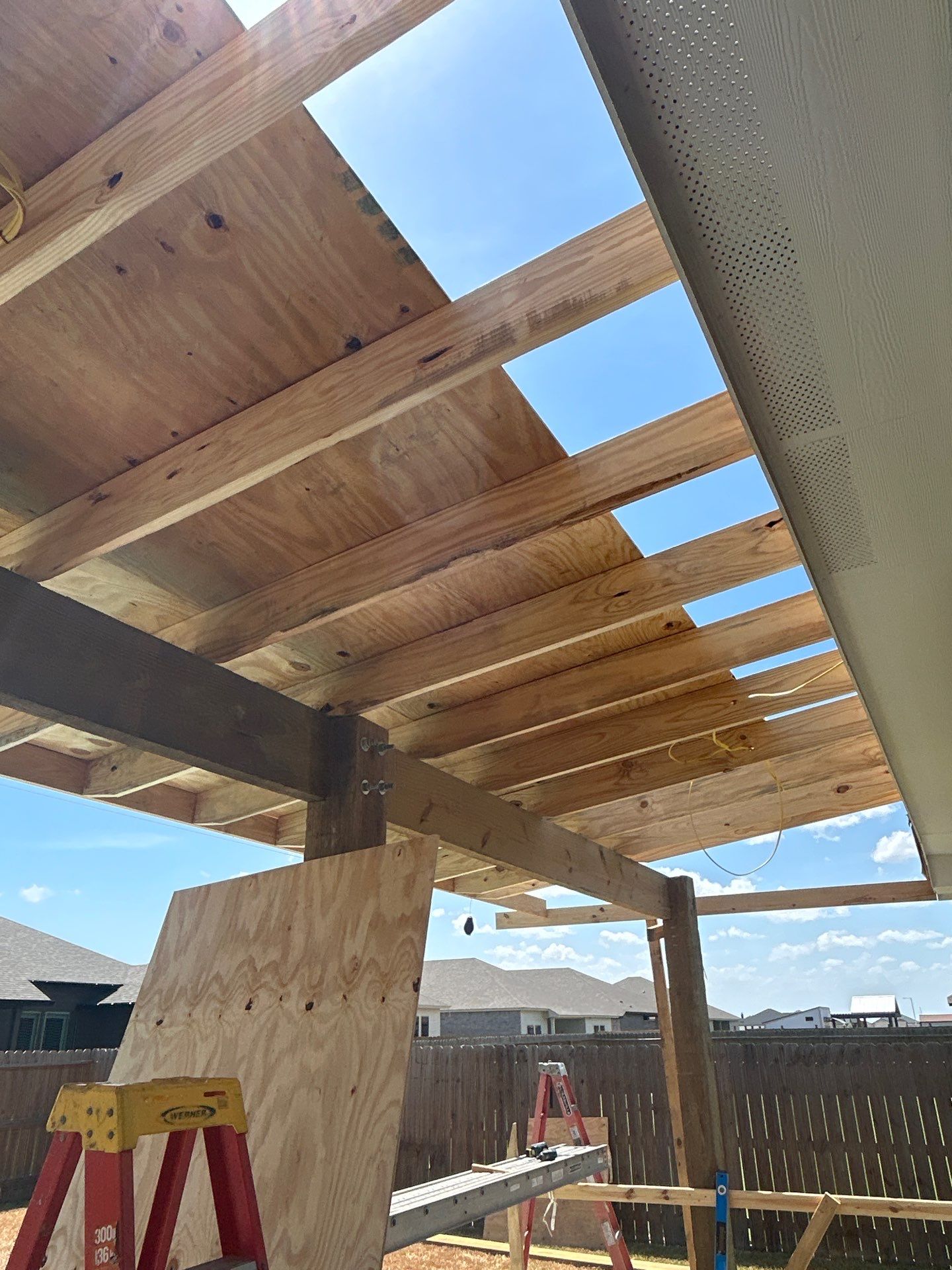 Patio Pool Cover by Bayfront Roofing and Construction