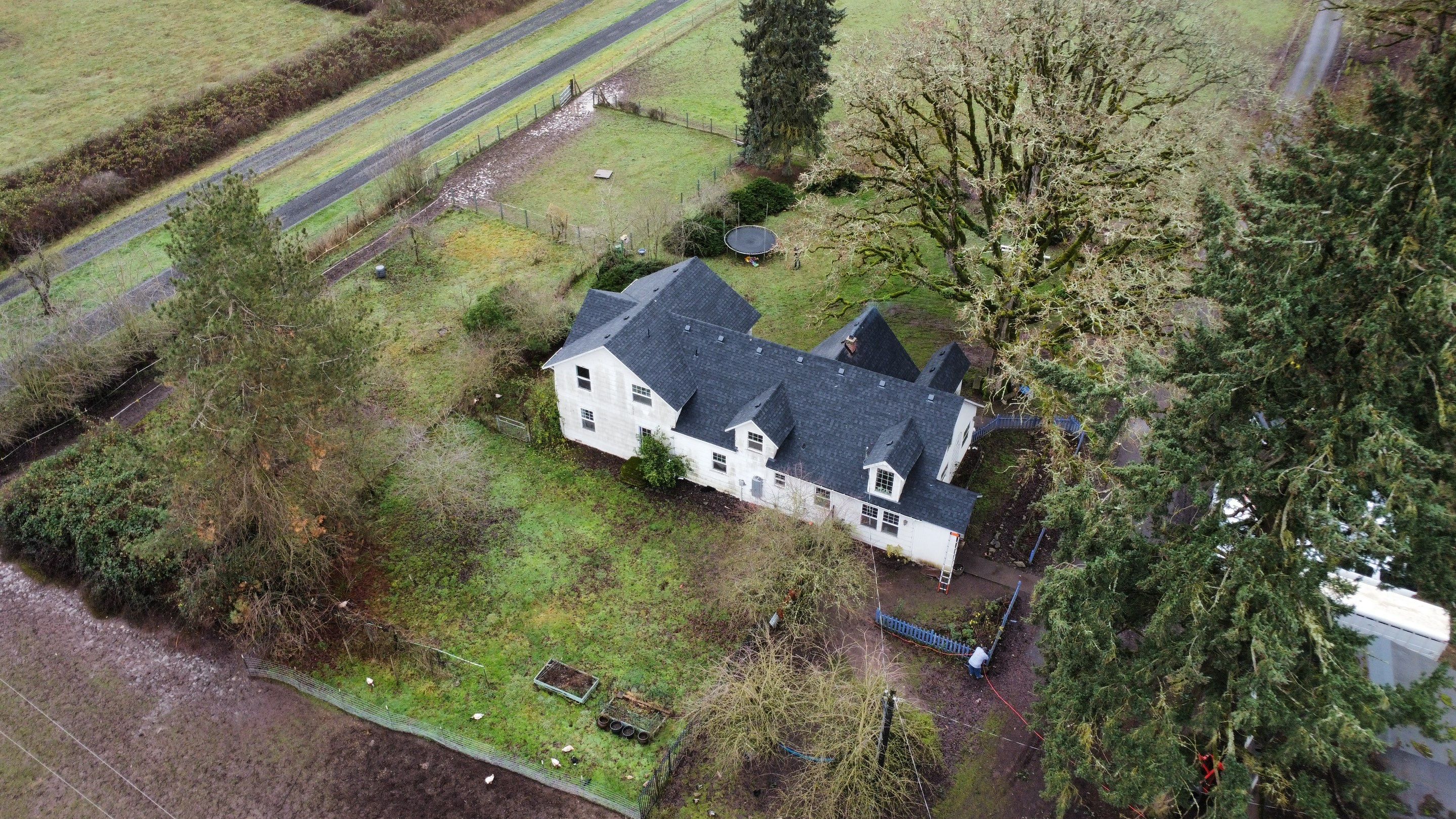 Residential Roofing Installation using IKO Dynasty (Color: Granite Black) by Orezona Building & Roofing Company, Inc.