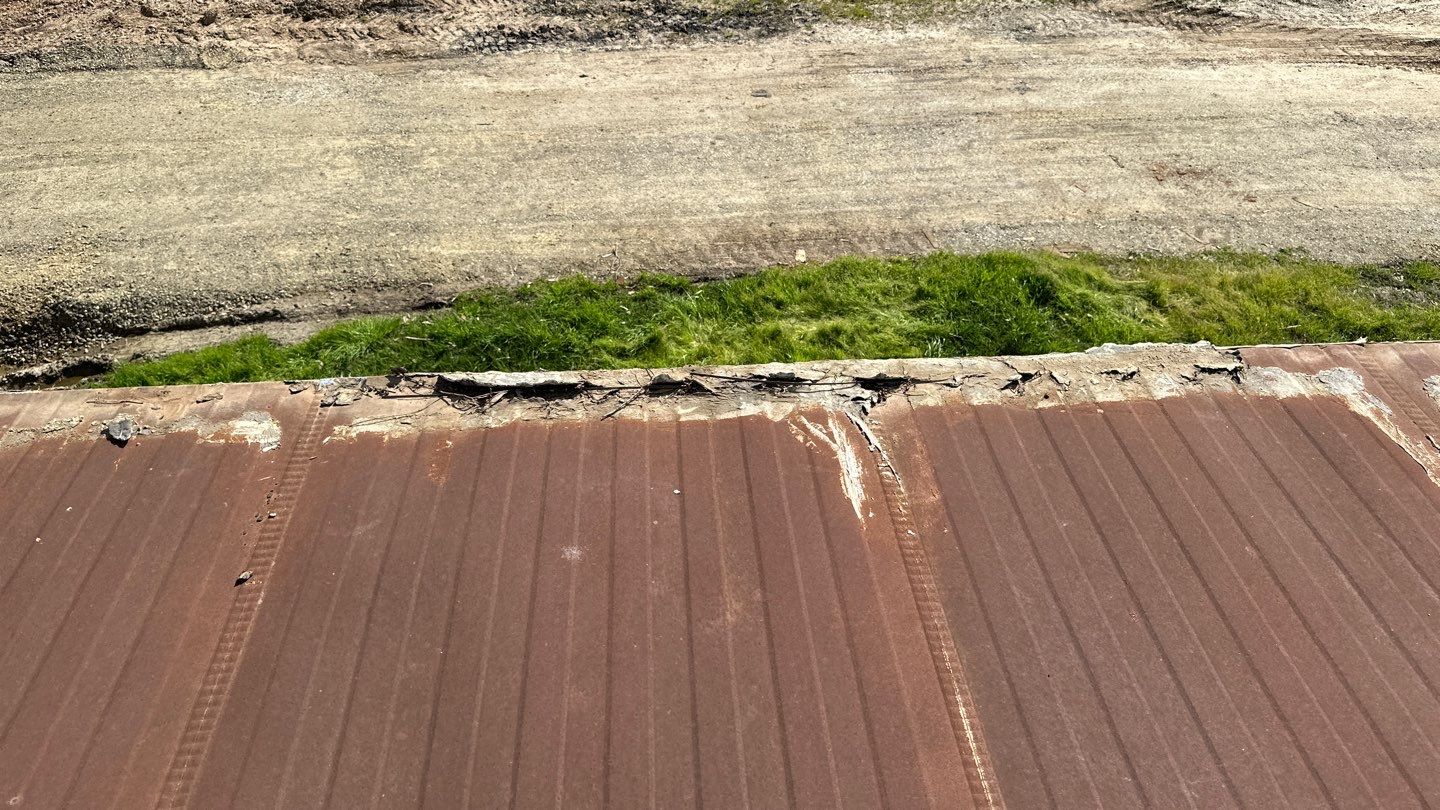 Foam and coatings on mobile home by Straight Edge Roofing Inc