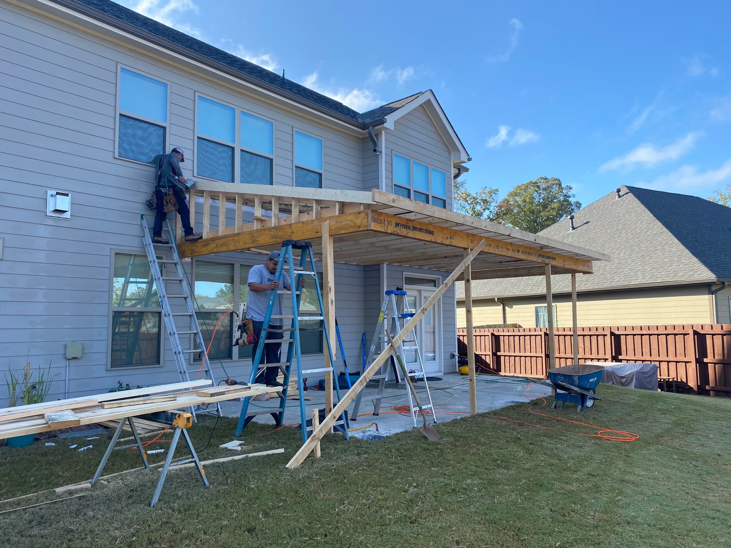 Custom Covered Porch with Beadboard Ceiling in Marietta by Swift Home Renovations