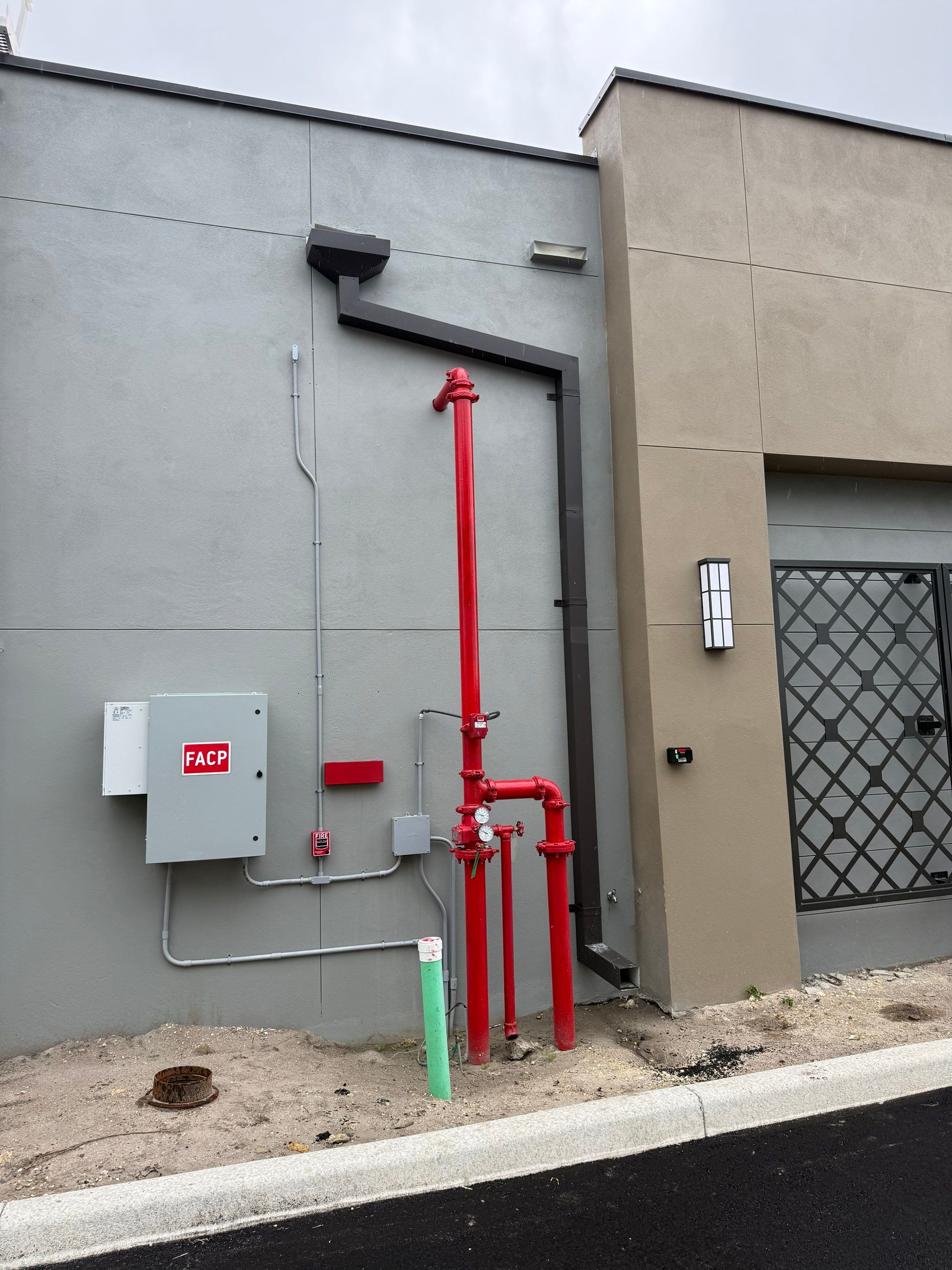 Downspout Installation using collector head in Cape Coral FL by Gutter Professors