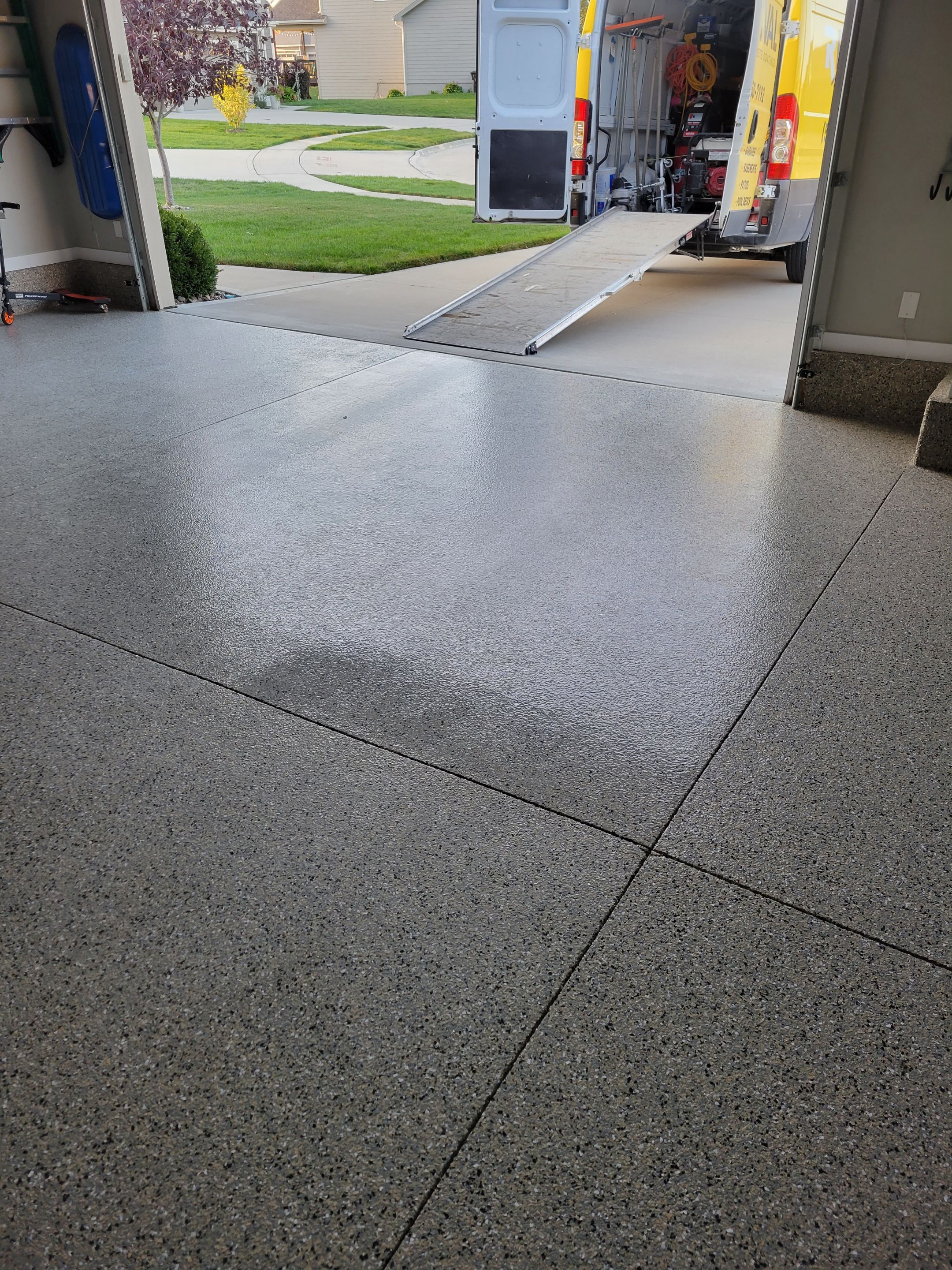 Grimes, IA Transformation: Professional Grade Garage Floor Coating by Revival Concrete Coatings